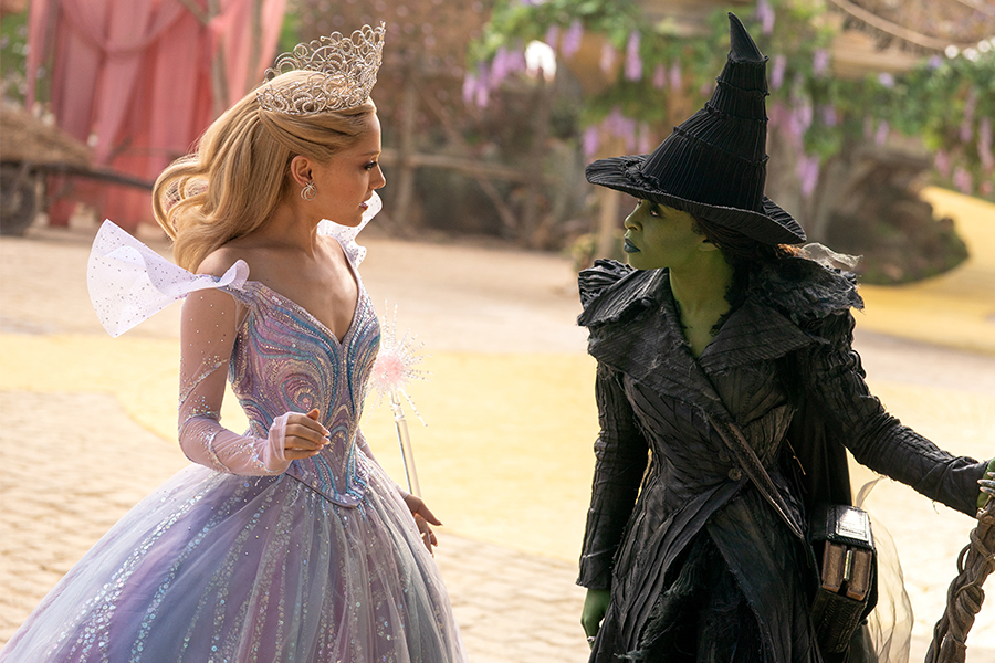 L to R: Ariana Grande is Glinda and Cynthia Erivo is Elphaba in WICKED FOR GOOD, directed by Jon M. Chu.