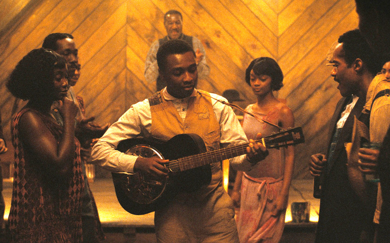 SINNERS, Miles Caton (center), 2025. © Warner Bros. / Courtesy Everett Collection