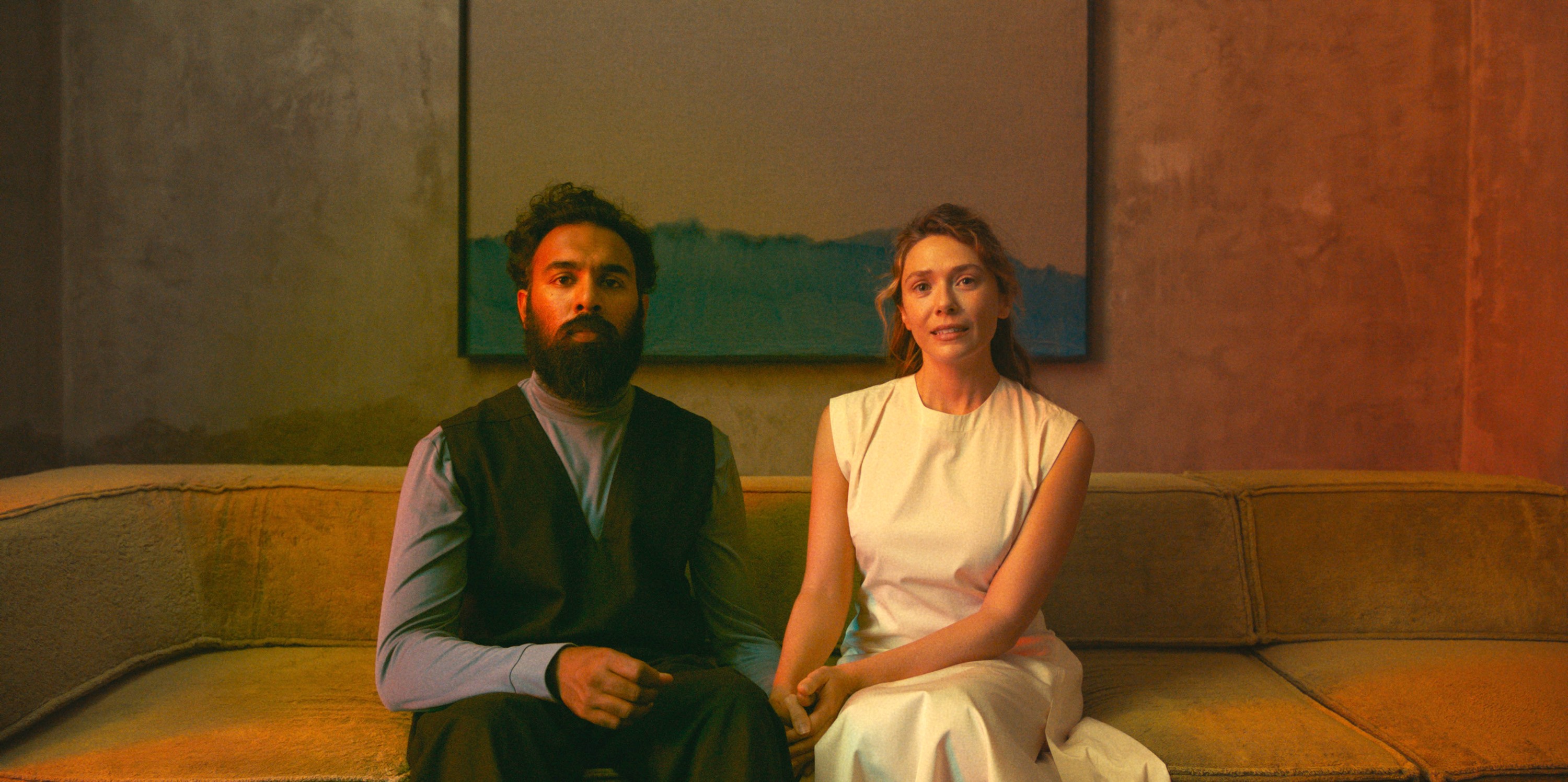 THE ASSESSMENT, from left: Himesh Patel, Elizabeth Olsen, 2024. ph: Magnus Jonck /© Magnolia Pictures /Courtesy Everett Collection