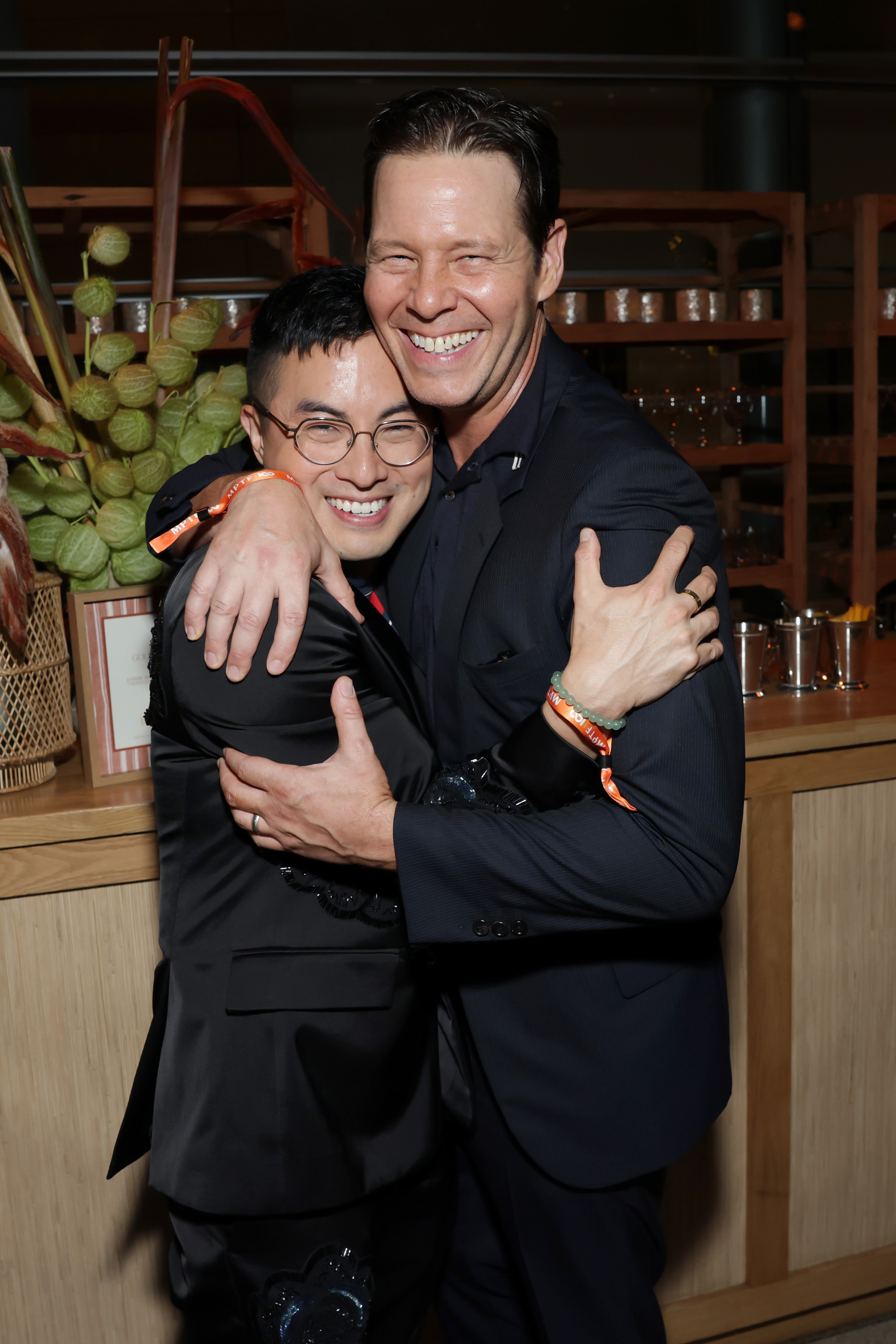 LOS ANGELES, CALIFORNIA - SEPTEMBER 13: (L-R) Bowen Yang and Ike Barinholtz attends MPTF's 19th Annual Evening Before at Century Park on September 13, 2025 in Los Angeles, California. (Photo by Matt Winkelmeyer/Getty Images for MPTF)
