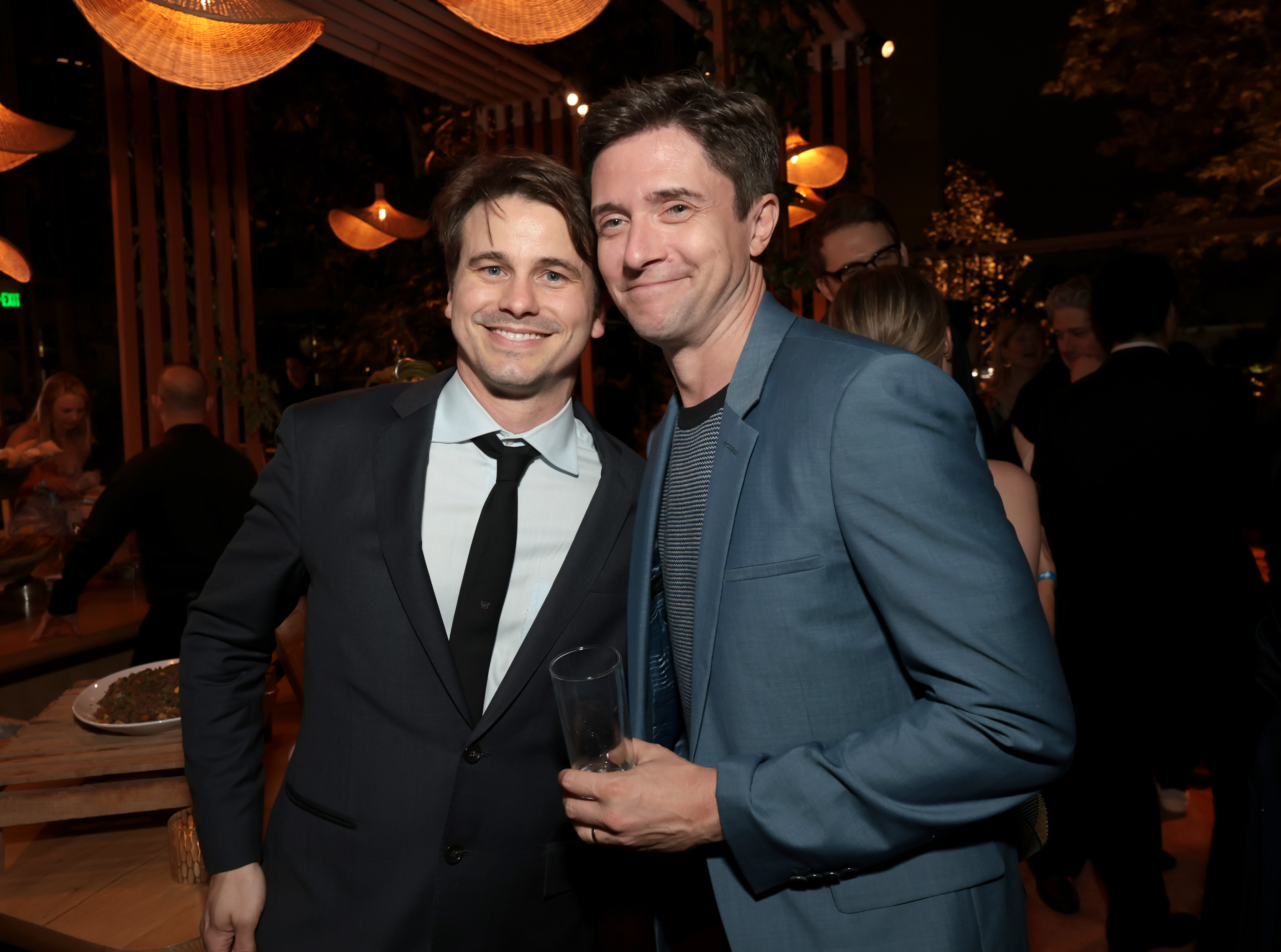 LOS ANGELES, CALIFORNIA - SEPTEMBER 13: (L-R) Jason Ritter and Topher Grace attend MPTF's 19th Annual Evening Before at Century Park on September 13, 2025 in Los Angeles, California. (Photo by Kevin Mazur/Getty Images for MPTF)