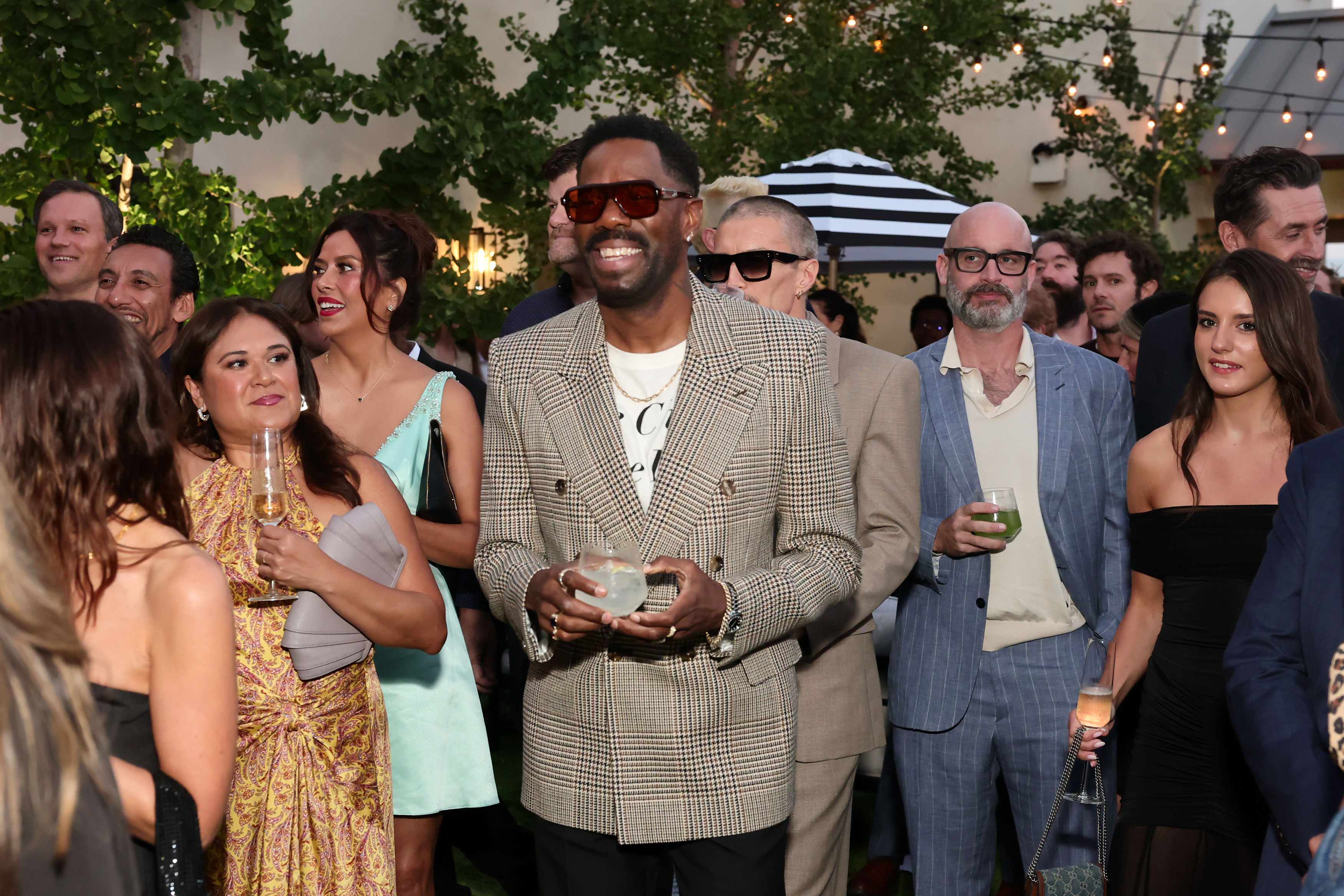 STUDIO CITY, CALIFORNIA - SEPTEMBER 12: Colman Domingo (C) and guests attend Netflix's 2025 Emmy's Toast at Private Residence on September 12, 2025 in Studio City, California. (Photo by Emma McIntyre/Getty Images for Netflix)