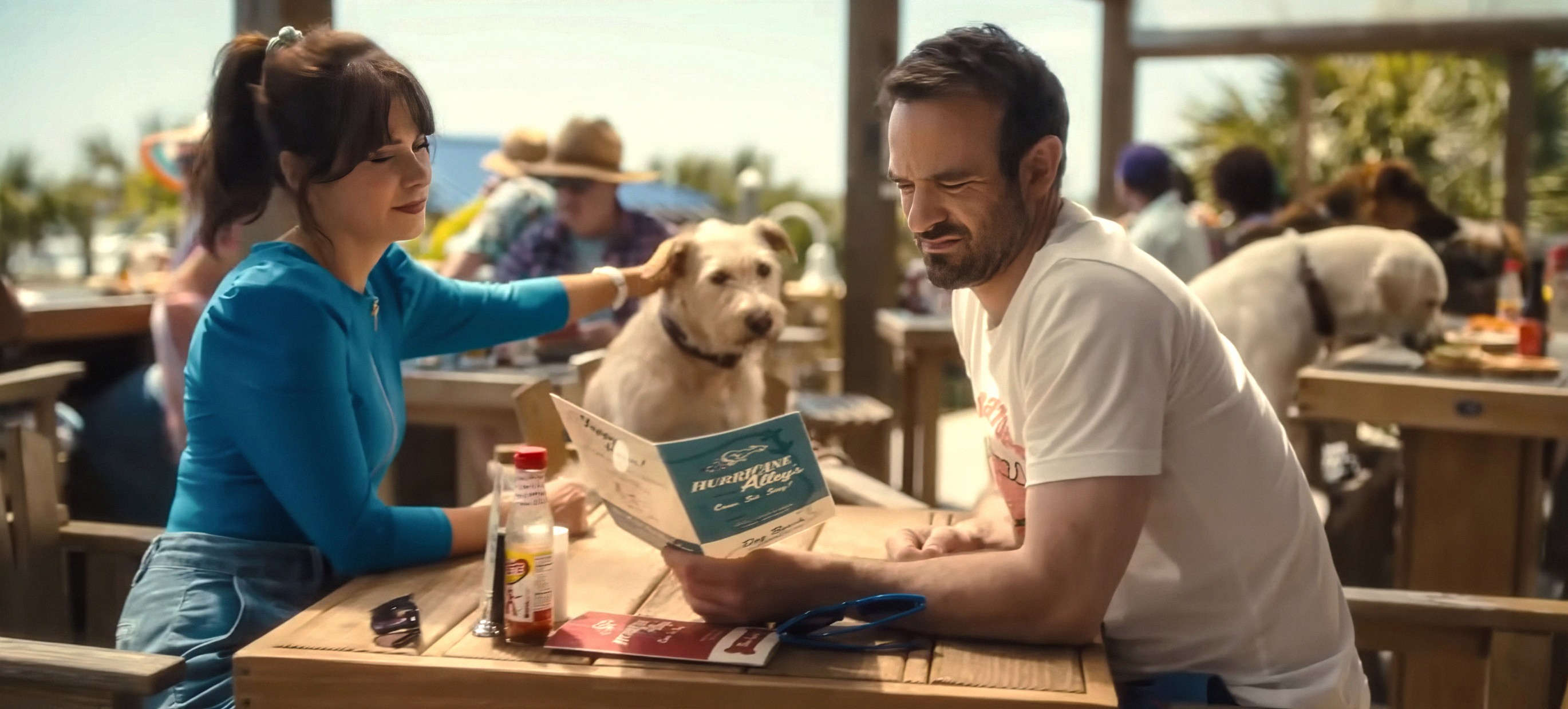 MERV, from left: Zooey Deschanel, Gus the dog as Merv, Charlie Cox, 2025. © Amazon Prime Video / Courtesy Everett Collection