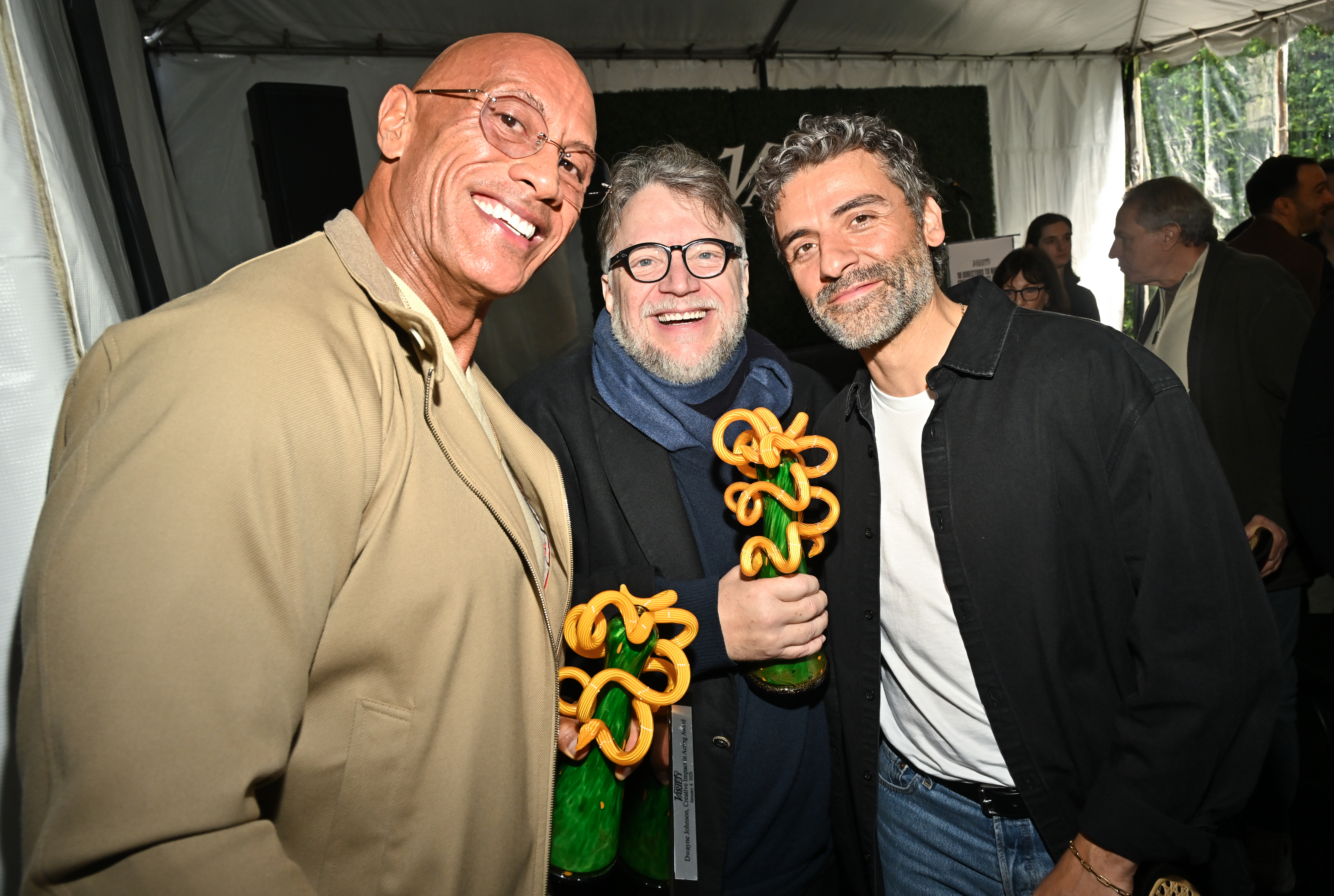 Dwayne Johnson, Guillermo del Toro and Oscar Isaac at The Creative Impact Awards And 10 Directors To Watch Brunch presented by Variety during the 2026 Palm Springs International Film Festival at The Parker Palm Springs on January 04, 2026 in Palm Springs, California. (Photo by Michael Buckner/Variety via Getty Images)