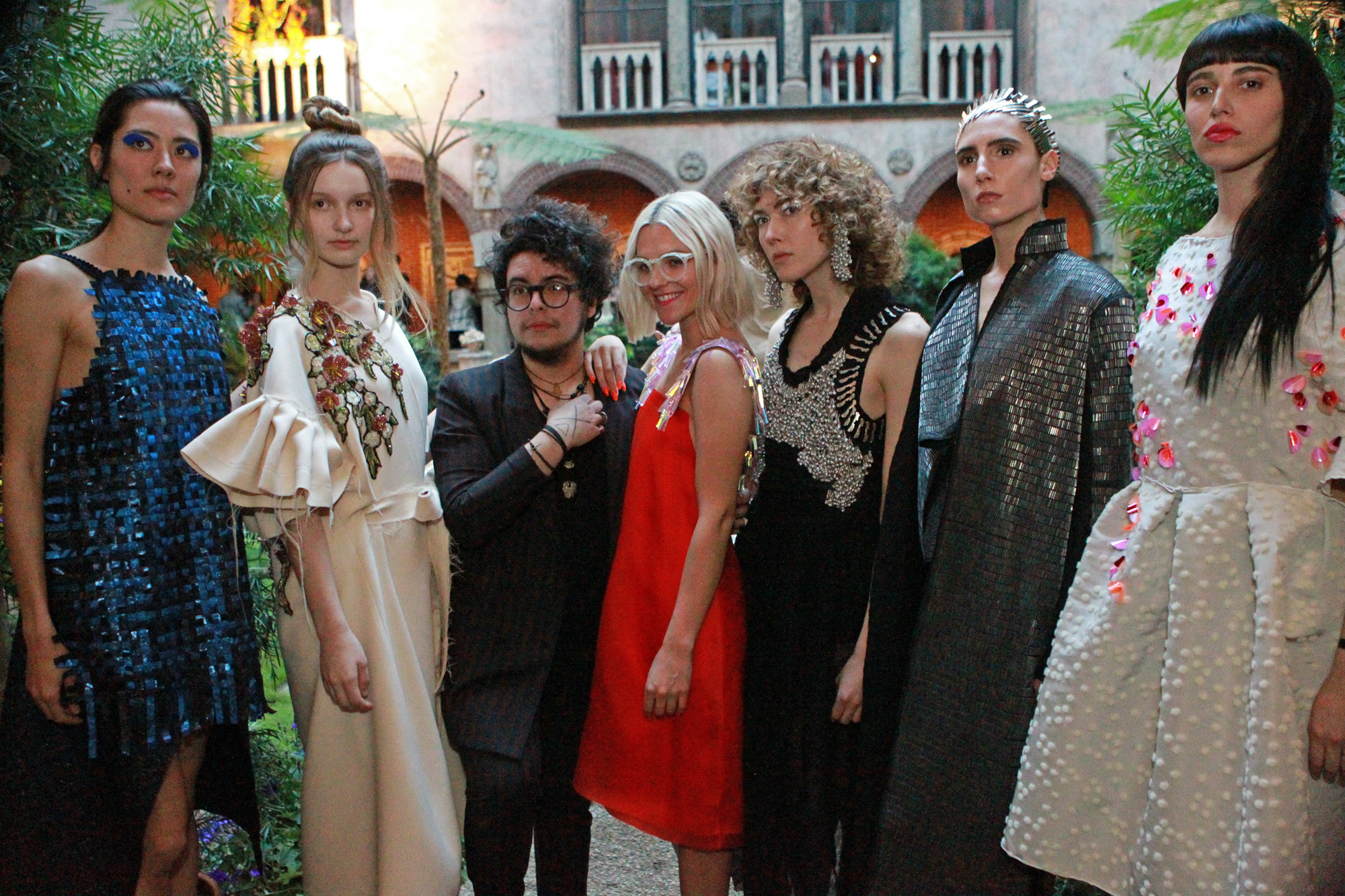 ( Boston, MA,04/05/17) models with the designers Christian Restian Restrepo (center left) and Erin Robertson (center right, red dress) at the Nasturtium Party held at the Gardner Museum. Wednesday, April 05, 2017. (Staff photo by Stuart Cahill) (Photo by Stuart Cahill/MediaNews Group/Boston Herald via Getty Images)