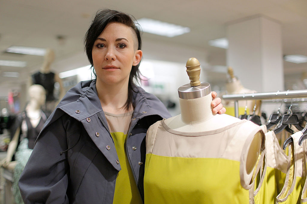 NEW YORK, NY - MARCH 22: Designer Michelle Franklin poses with her Project Runway Lord & Taylor challenge winning design during an in-store visit to the Lord & Taylor Flagship store on March 22, 2013 in New York City. (Photo by Jemal Countess/WireImage)