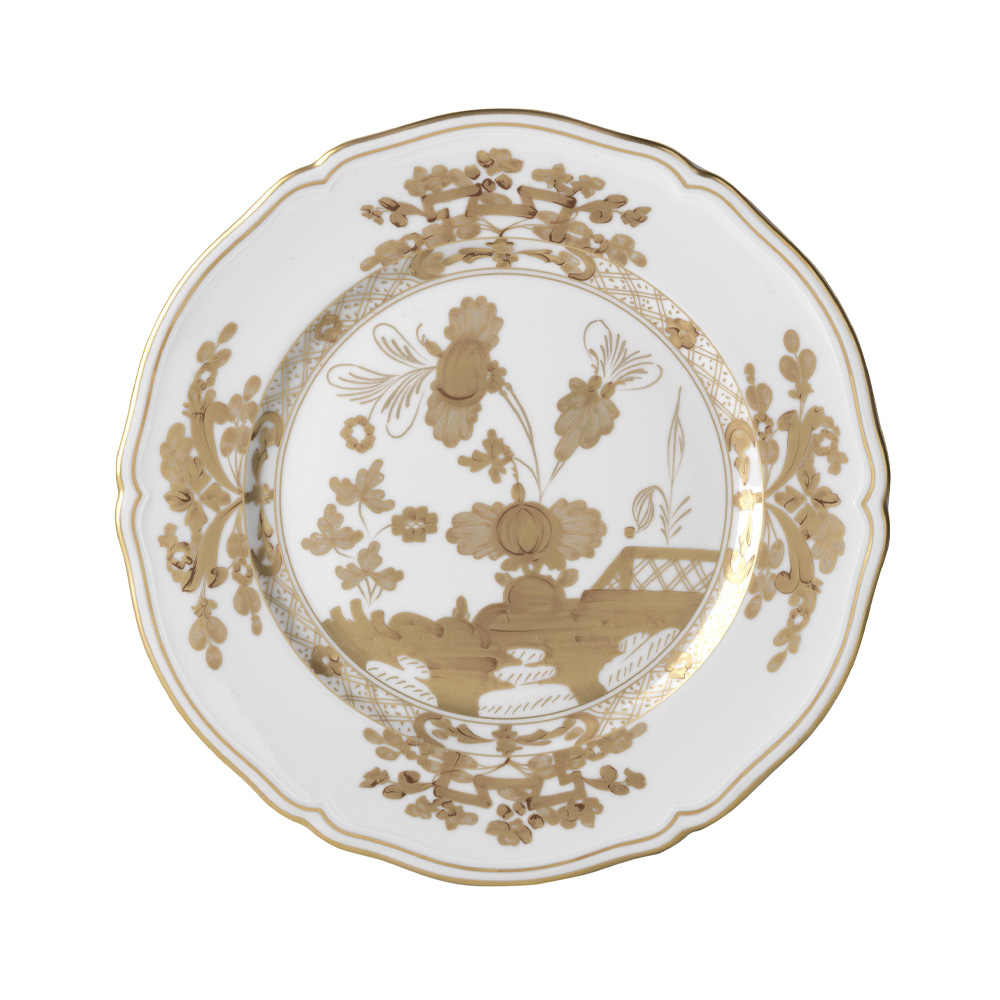 gold and white plate