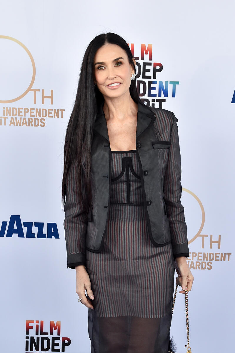 Demi Moore wears thom browne sheer dress at 2025 Film Independent Spirit Awards - Arrivals on February 22, 2025 in Santa Monica, California.