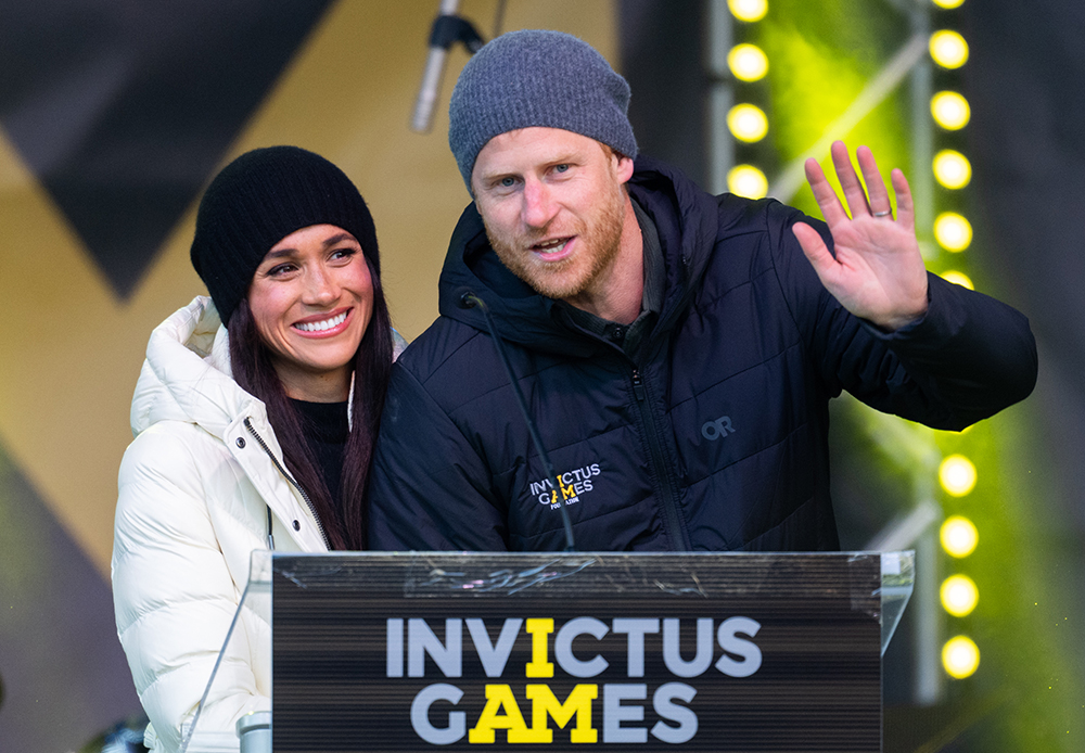 Meghan, Duchess of Sussex and Prince Harry, Duke of Sussex during day two of the 2025 Invictus Games on Feb. 10 in Whistler, Canada, Mackage coat, Sorel boots, black and white, royals, street style