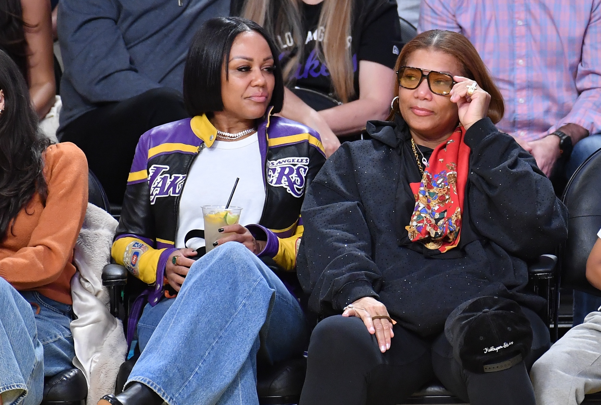 Eboni Nichols and Queen Latifah at the Los Angeles Lakes game on March 19.