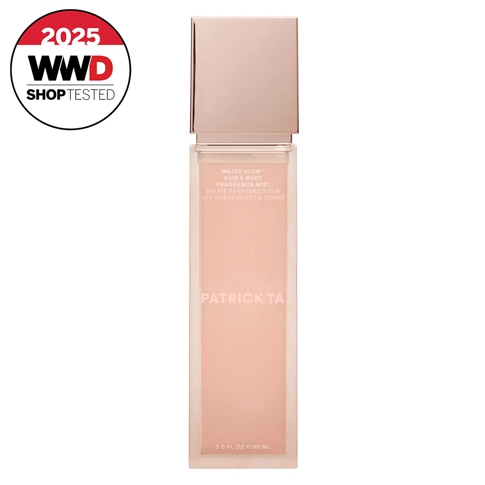 light pink bottle of body spray