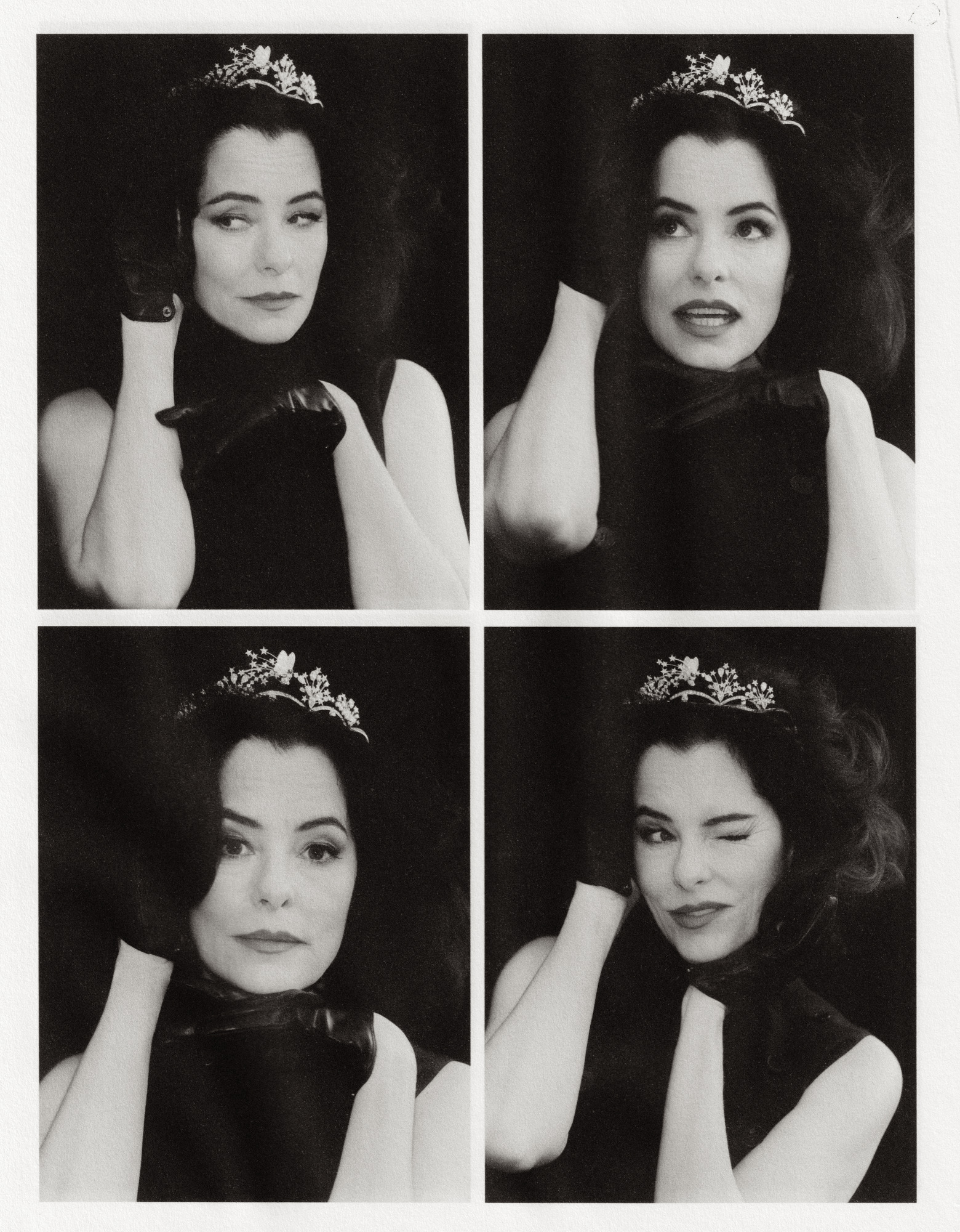 McQueen wool gabardine dress with shredded silk creponne trim. Carolina Amato gloves. Chopard tiara from the Red Carpet Collection in 18K white gold set with diamonds and mother of pearl.