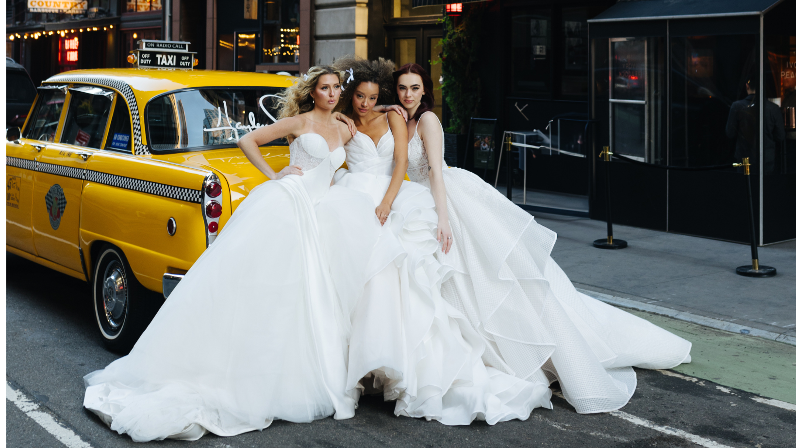 Models in bridal looks from the Hayley Paige bridal collection.