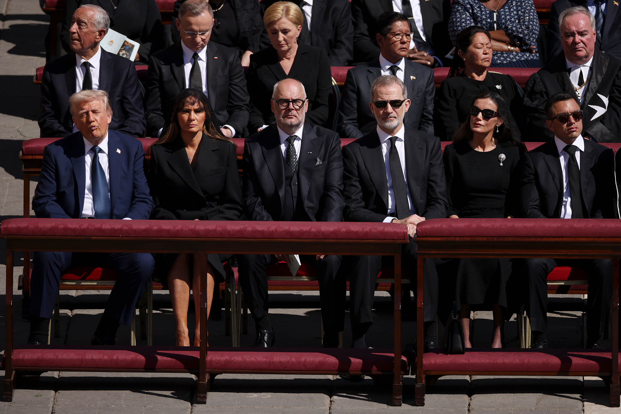 VATICAN CITY, VATICAN - APRIL¬†26: (L-R) US President Donald Trump, US First Lady Melania Trump, Estonian President Alar Karis, King Felipe VI of Spain, Queen Letizia of Spain Ecuador's President Daniel Noboa attend the funeral of Pope Francis in St. Peter‚Äôs Square on April 26, 2025 in Vatican City, Vatican. Pope Francis died on April 21st at the age of 88. Born in Argentina as Jorge Mario Bergoglio, he was the first Latin American and the first Jesuit to become Pope when elected in 2013. Taking the name Francis after St Francis of Assisi, he promoted a more humble version of the papacy than many of his predecessors. He will be buried outside of the Vatican in a simple wooden coffin at the Basilica Santa Maria Maggiore.  (Photo by Dan Kitwood/Getty Images)