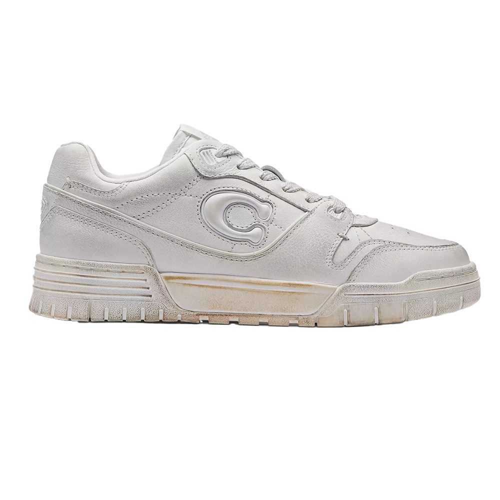Coach’s ’90s Pack Soho Sneaker Hit On All Summer's Top Trends