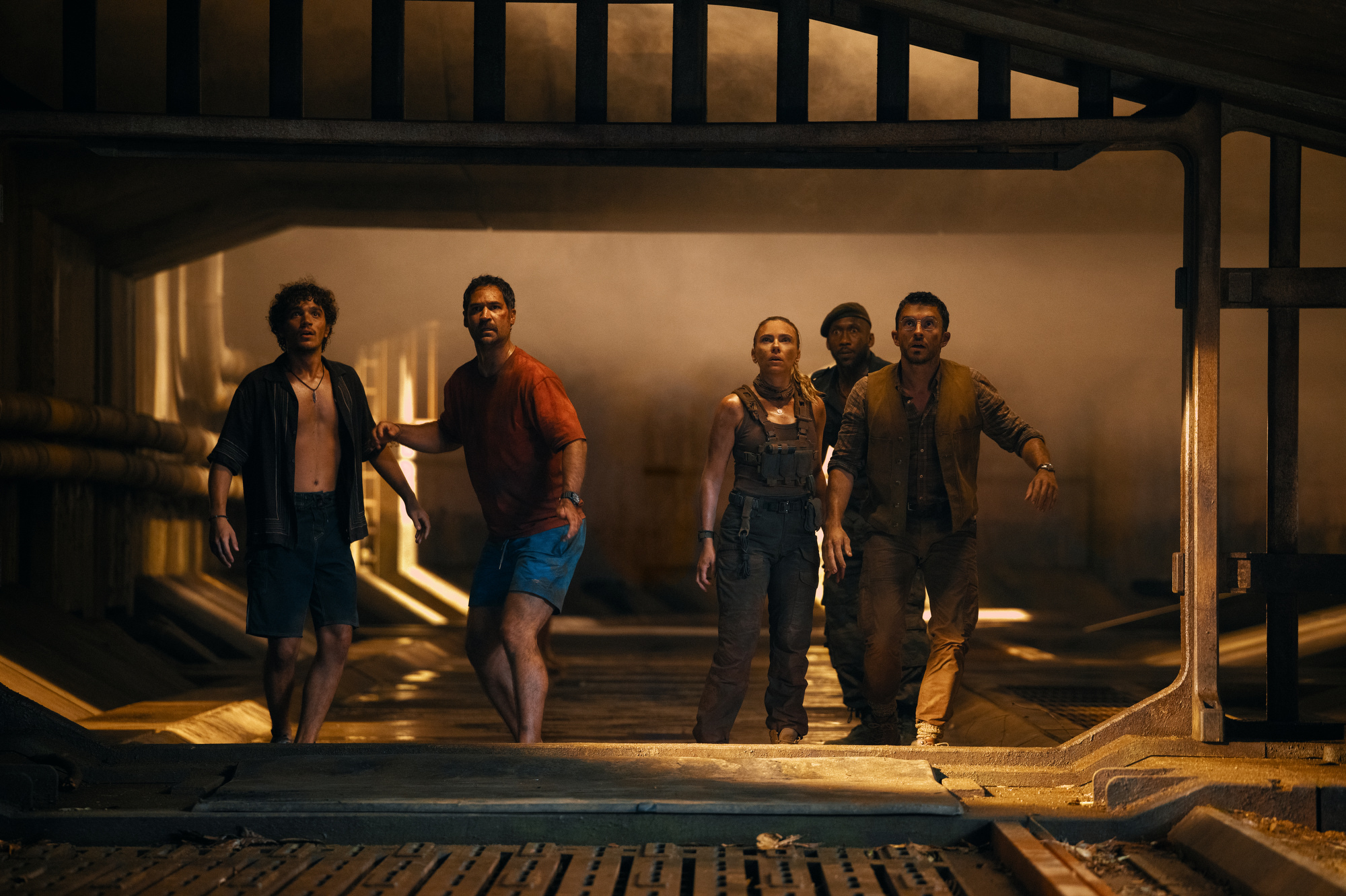 Manuel Garcia-Rulfo with David Iacono, Scarlett Johansson, Mahershala Ali and Jonathan Bailey in 'Jurassic World Rebirth.'