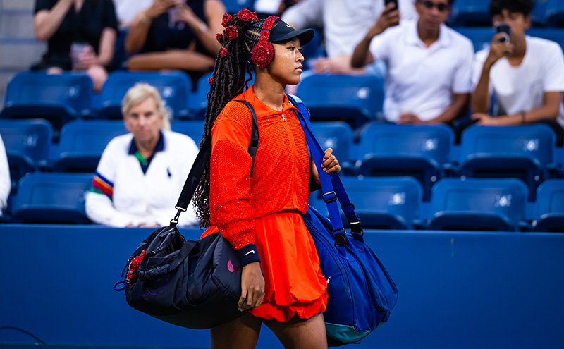 Naomi Osaka wears a custom red rose sparkling Nike tennis kit for her opening round at the US Open 2025 on Aug. 26 in New York City.