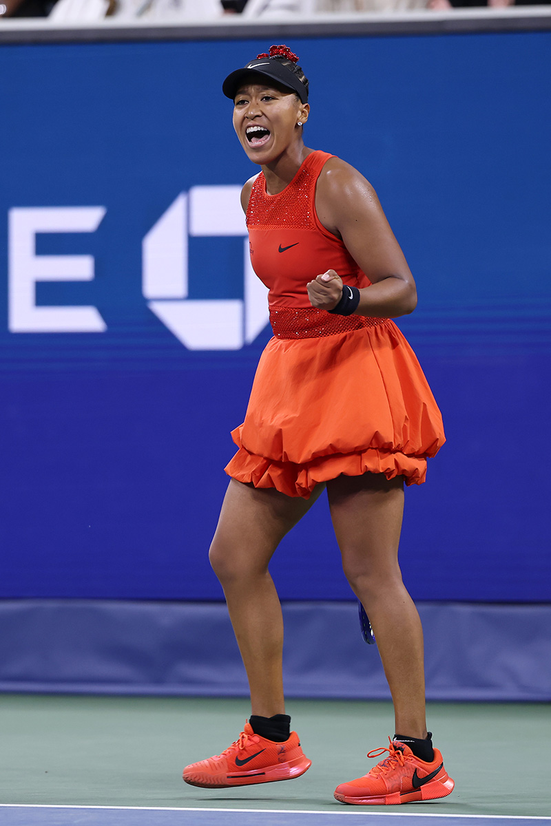 Naomi Osaka wears a custom red rose sparkling Nike tennis kit for her opening round at the US Open 2025 on Aug. 26 in New York City.