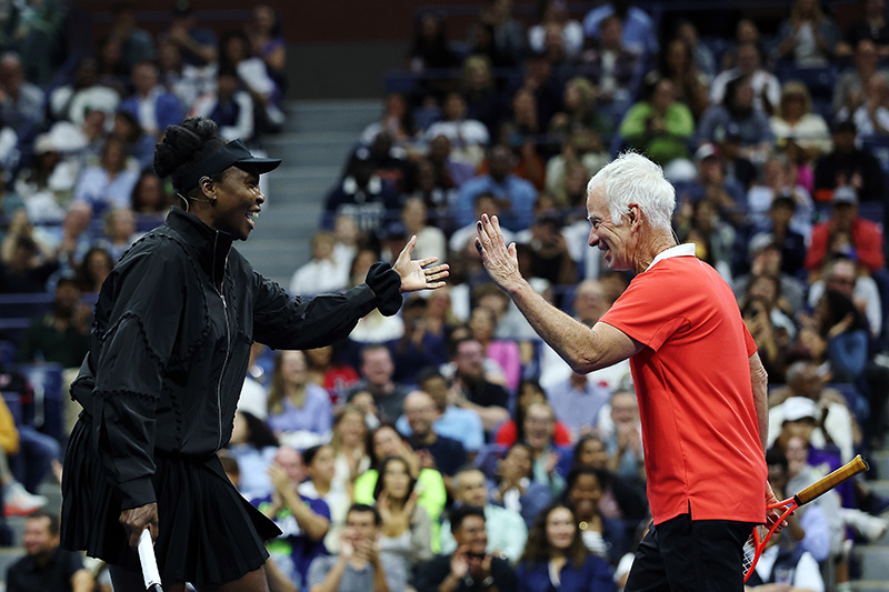 NEW YORK, NEW YORK - AUGUST 21: Venus Williams and John McEnroe react during the Stars of the Open exhibition match ahead of the 2025 US Open at USTA Billie Jean King National Tennis Center on August 21, 2025 in the Queens borough of New York City. (Photo by Sarah Stier/Getty Images)