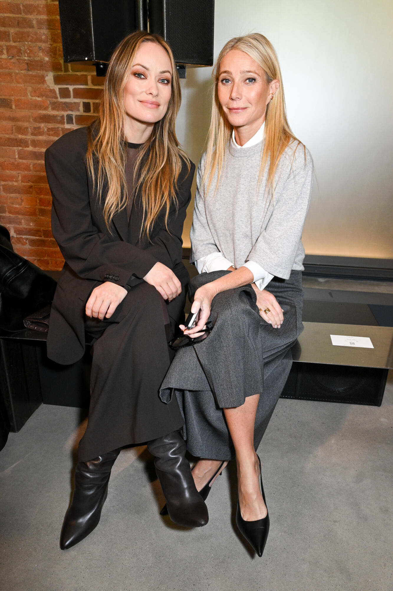 Olivia Wilde, Gwyneth Paltrow at the Michael Kors fashion show as part of Spring/Summer 2026 New York Fashion Week held at the Terminal Warehouse on September 11, 2025 in New York, New York.
