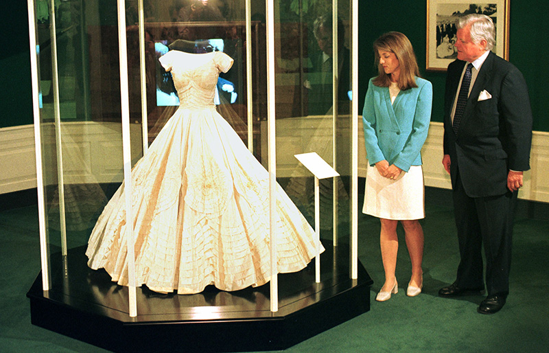 (Original Caption) Caroline and Ted Kennedy admire Jackie K's wedding dress on exhibition at the Kennedy library. (Photo by Brooks Kraft LLC/Sygma via Getty Images)