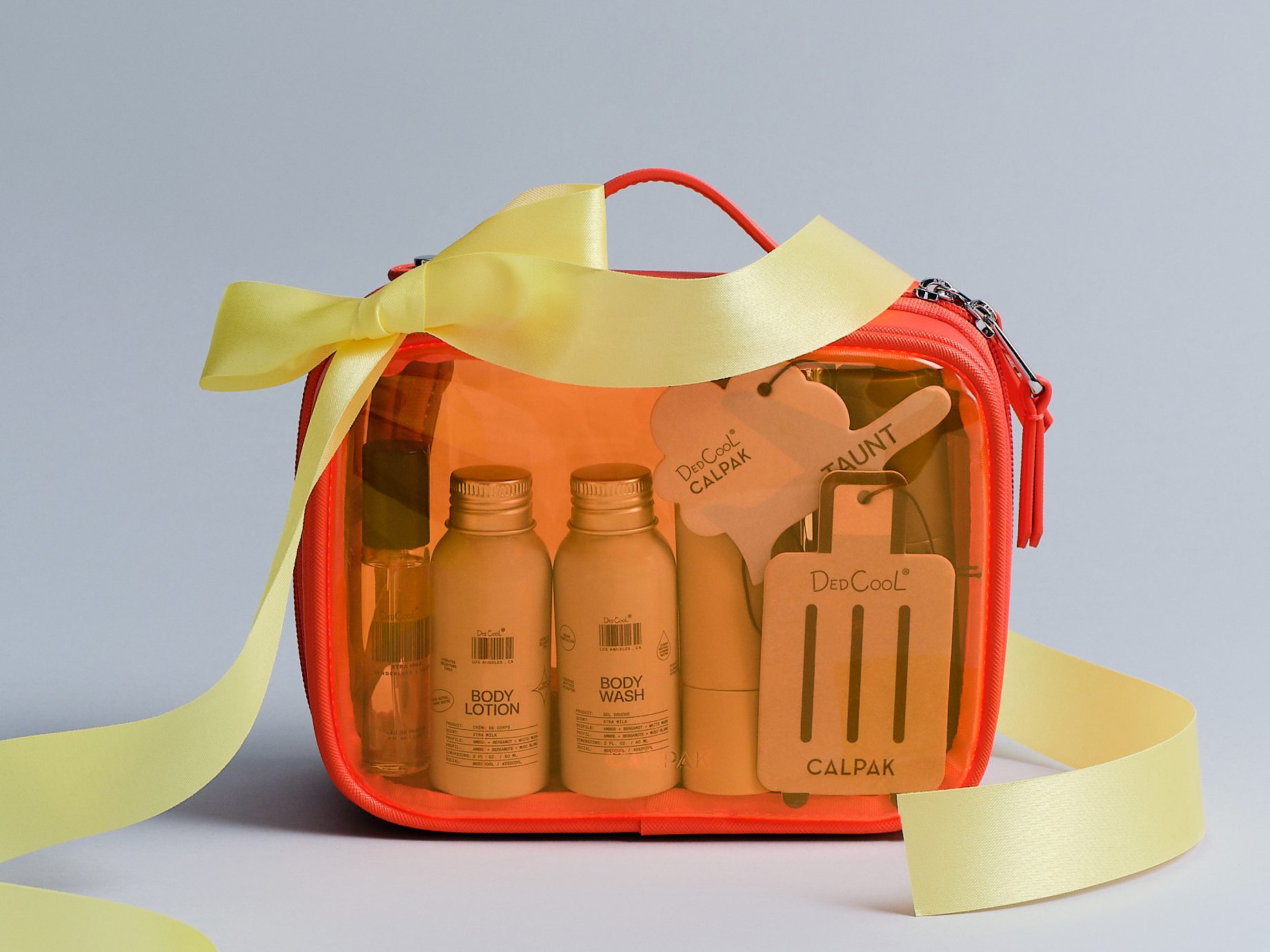 The bundle includes body lotion, body wash, a sticker sheet and air freshners.