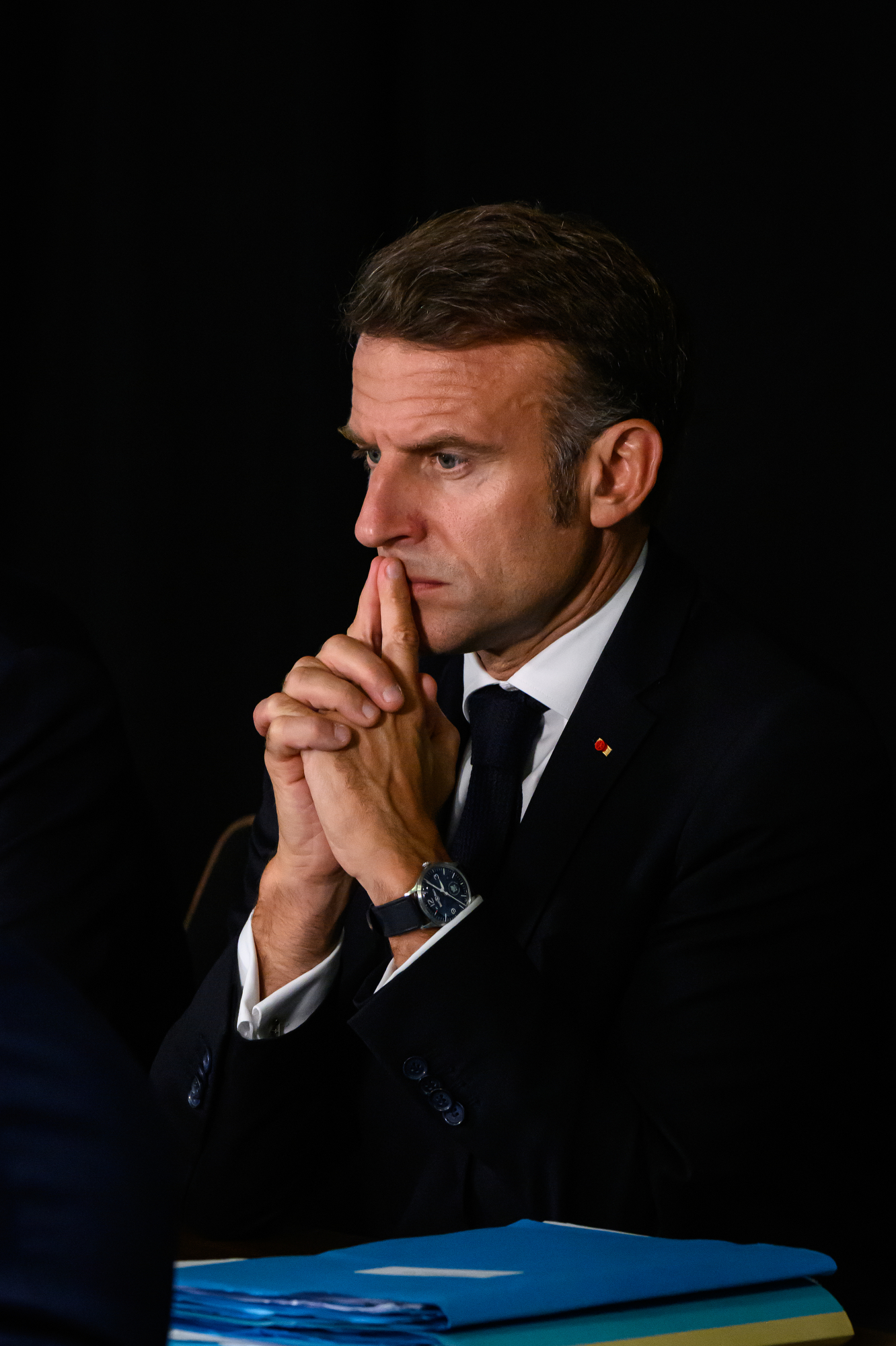 LONDON, ENGLAND - JULY 10: French President Emmanuel Macron listens as he co-hosts a meeting of the Coalition of the Willing with UK Prime Minister Keir Starmer during a joint military visit to the Northwood Headquarters, on July 10, 2025 in London, England. President Emmanuel Macron and Mrs Brigitte Macron visit the UK in the first visit State Visit made by France in 17 years. They are staying at Windsor Castle, hosted by King Charles III and Queen Camilla, and a banquet will be held there in their honour. The Macrons will visit Imperial College, and the President will address Parliament during his stay. (Photo by Leon Neal/Getty Images)