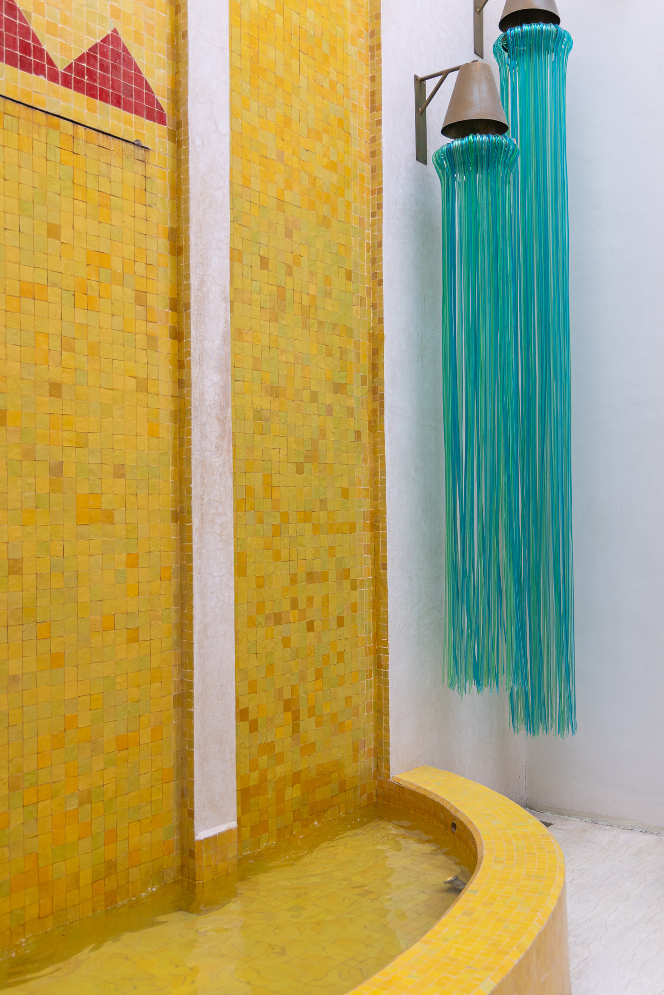 The fountain inside Riad Romeo was designed by designer Romeo Gigli. The