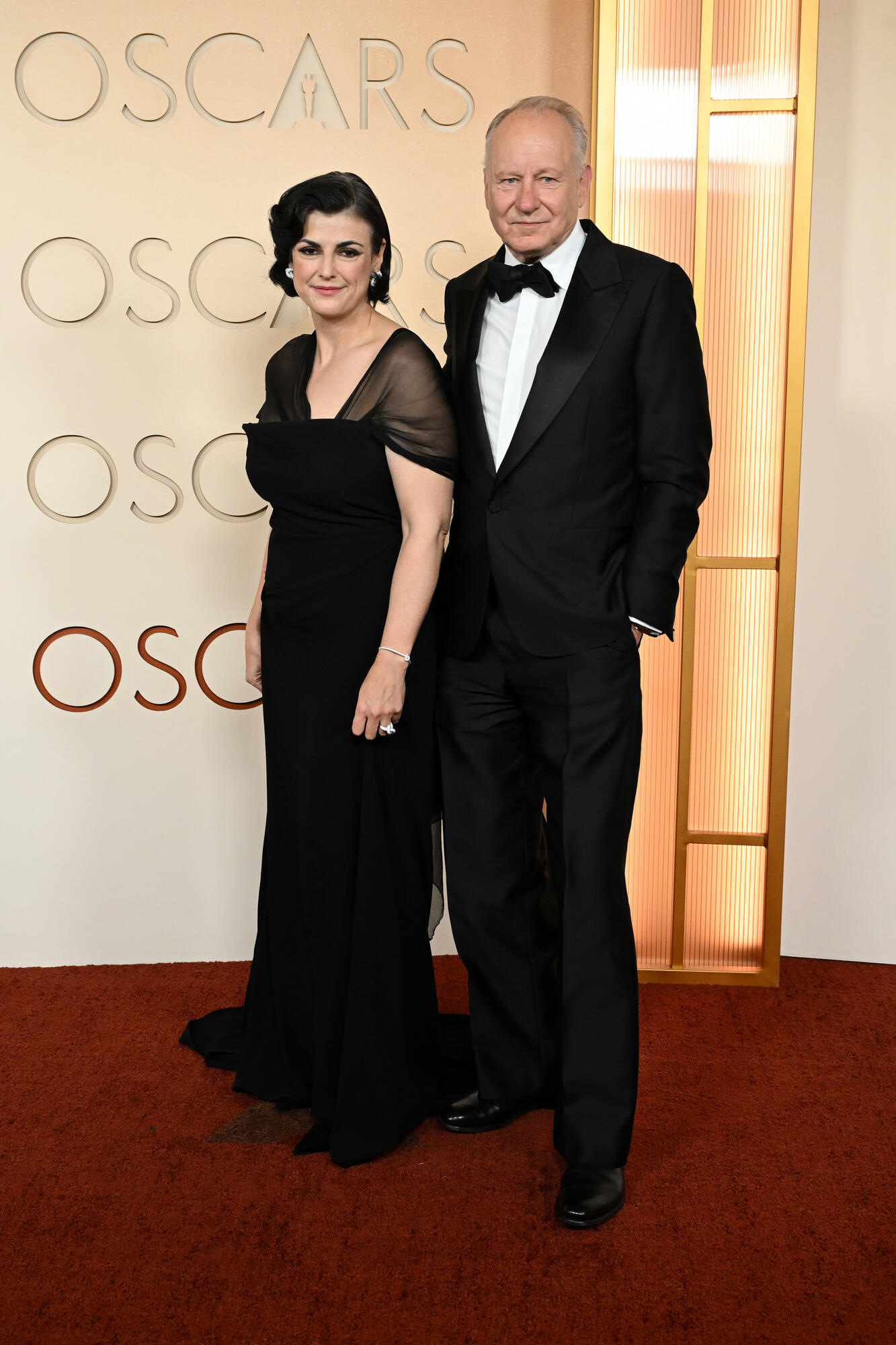 Megan Everett-Skarsgard and Stellan Skarsgård at the 98th Annual Oscars held at Dolby Theatre on March 15, 2026 in Hollywood, California.
