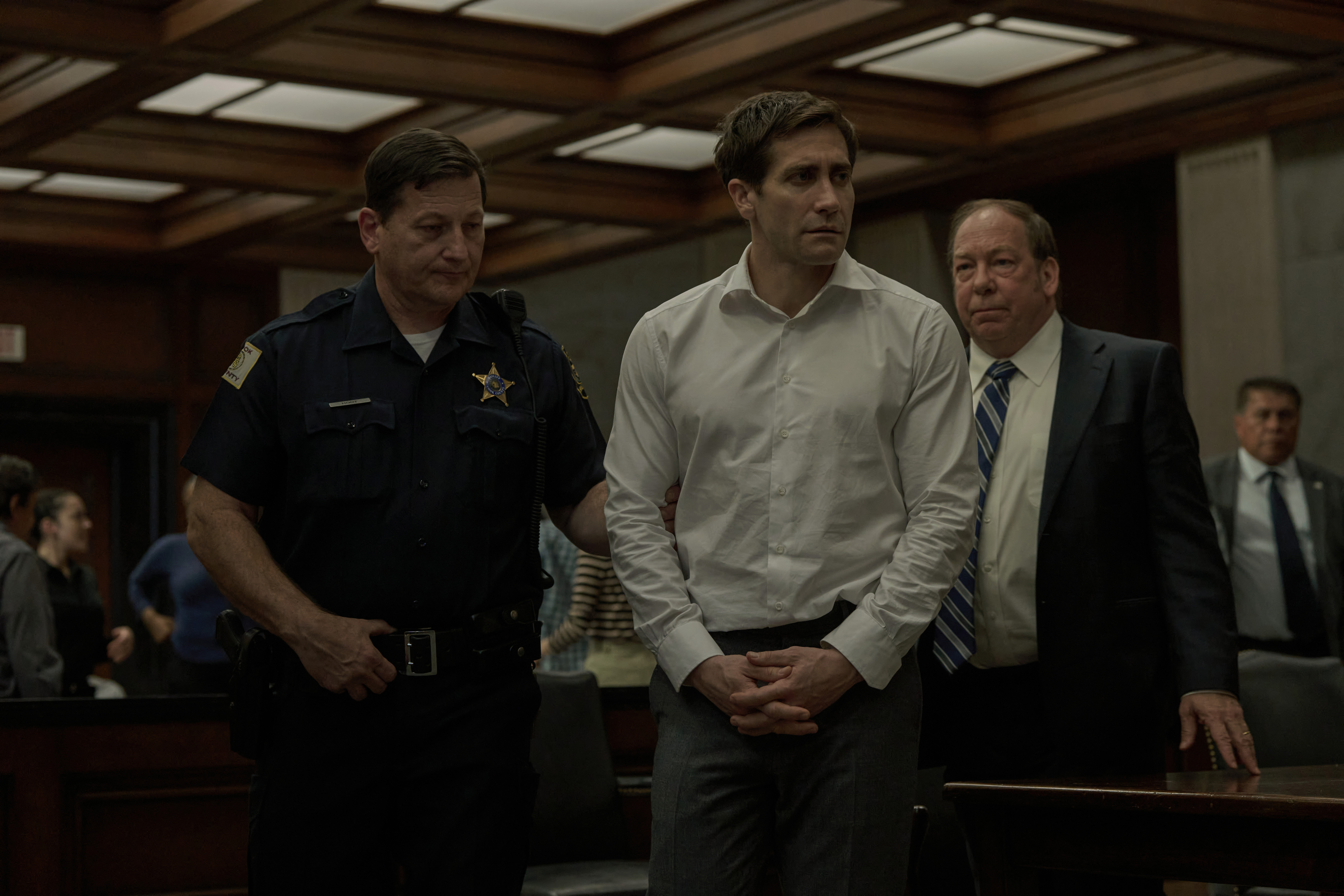 Jake Gyllenhaal and Bill Camp in "Presumed Innocent,"