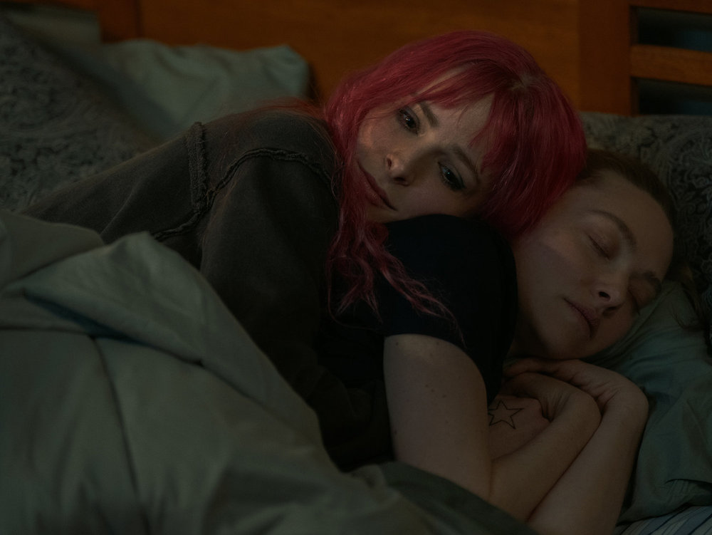 LONG BRIGHT RIVER -- "Let Me In" Episode 102 -- Pictured: (l-r) Ashleigh Cummings as Kacey, Amanda Seyfried as Mickey -- (Photo by: David Holloway/PEACOCK)