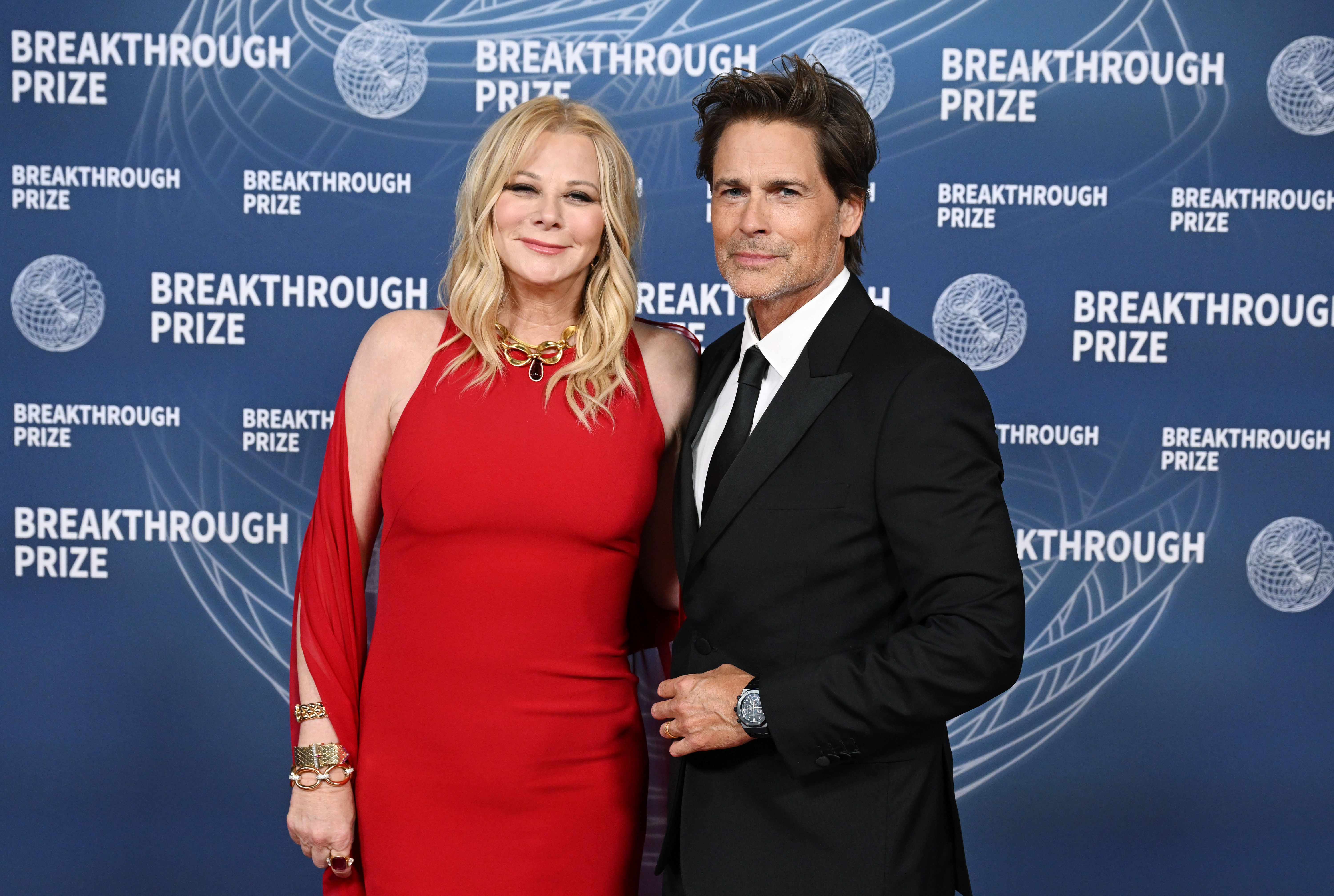 Sheryl Berkoff, Rob Lowe at The 11th Breakthrough Prize Ceremony held at Barker Hanger on April 05, 2025 in Santa Monica, California.