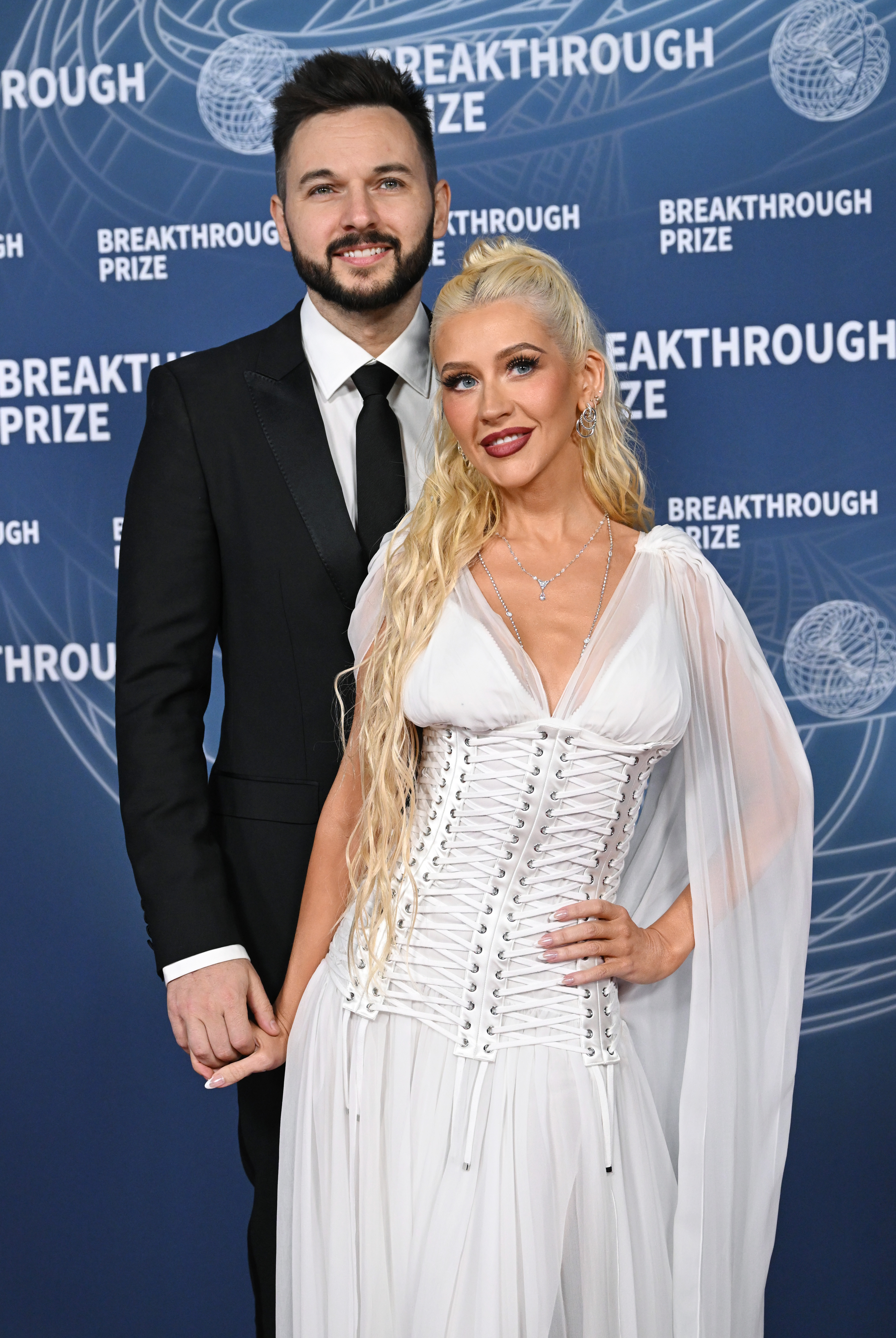 Matthew Rutler, Christina Aguilera at The 11th Breakthrough Prize Ceremony held at Barker Hanger on April 05, 2025 in Santa Monica, California.
