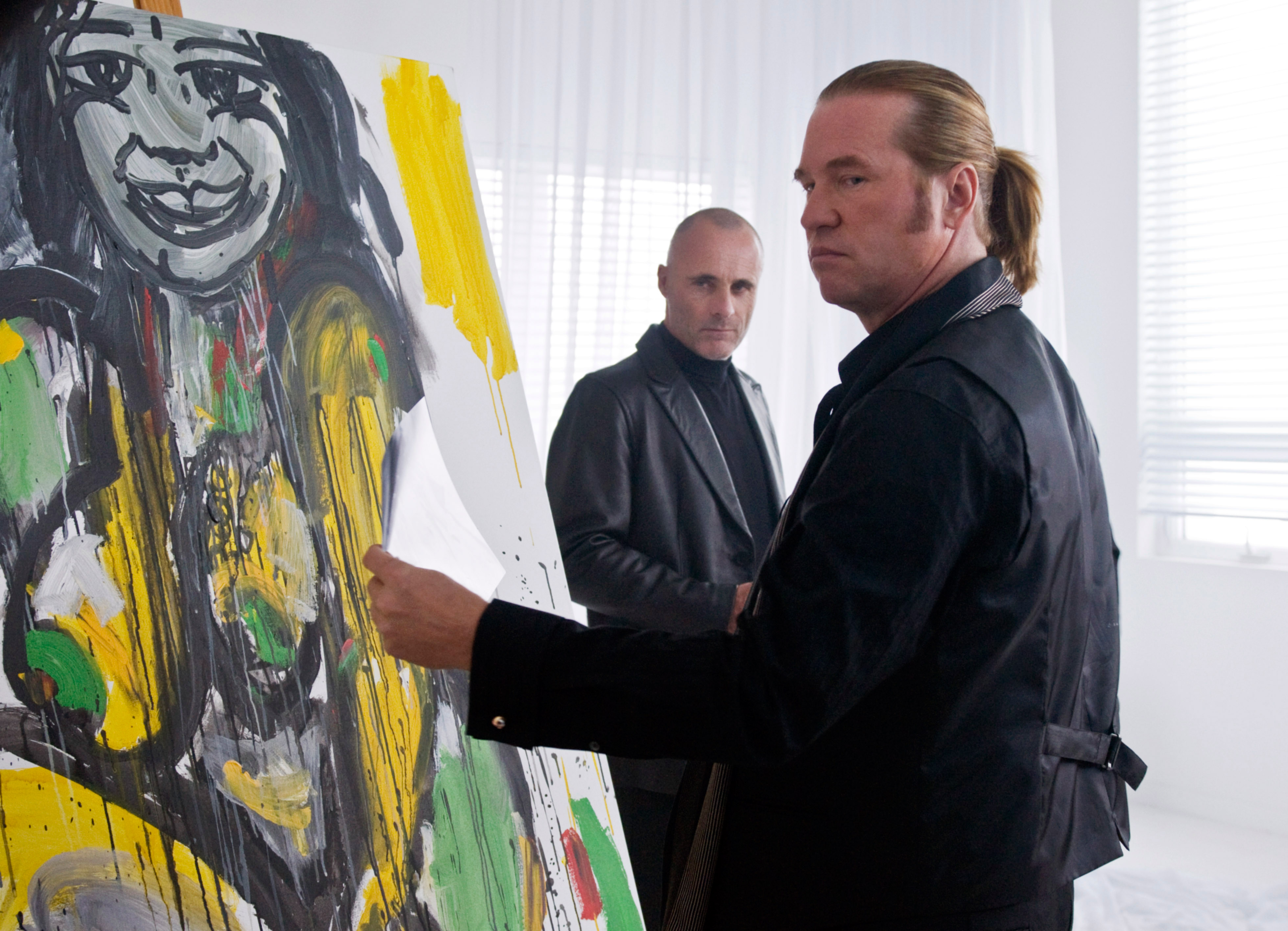 MACGRUBER, foreground: Val Kilmer, 2010, Ph: Greg Peters/©Universal/courtesy Everett Collection