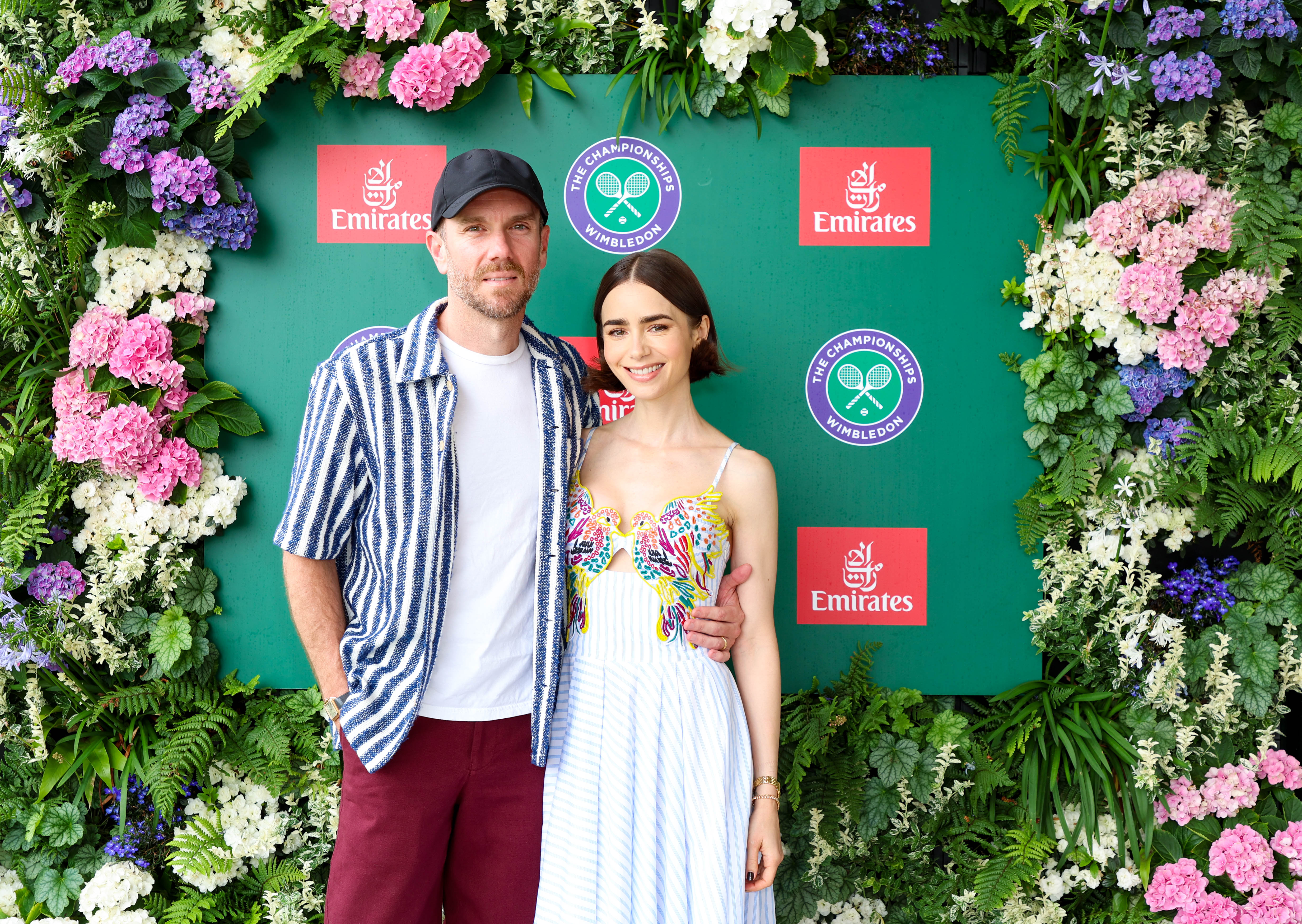 WIMBLEDON, ENGLAND - JULY 6: Charlie McDowell and Lily Collins attend as a guest of Emirates, Official Airline Partner of The Championships, Wimbledon on July 6, 2025 in Wimbledon, England. (Photo by Hoda Davaine/Getty Images for Emirates)