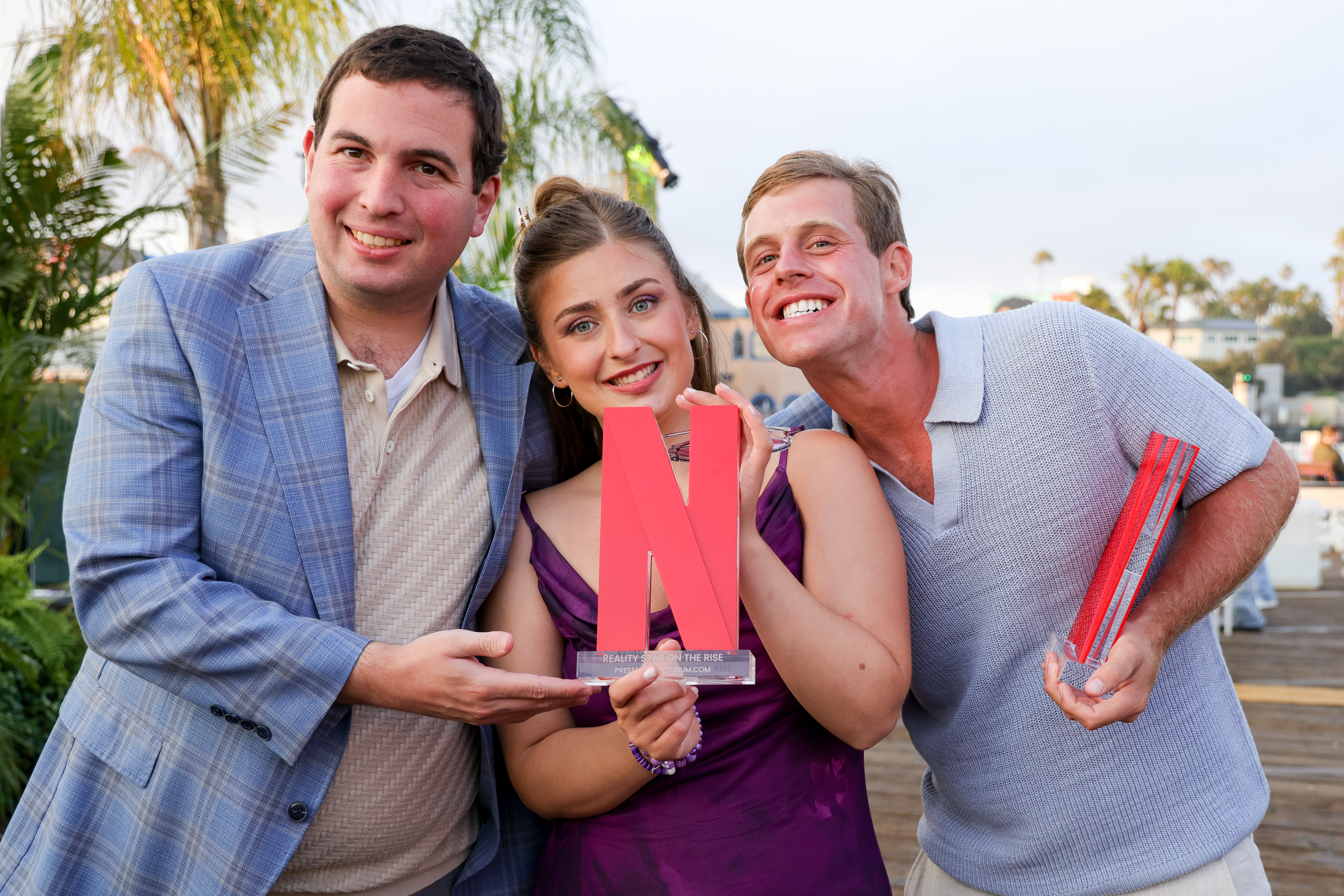 David Isaacson, Abbey Romeo, Tanner Smith at the Netflix Summer Break held at Santa Monica Pier on July 17, 2025 in Santa Monica, California. (Photo by River Callaway/Variety via Getty Images)