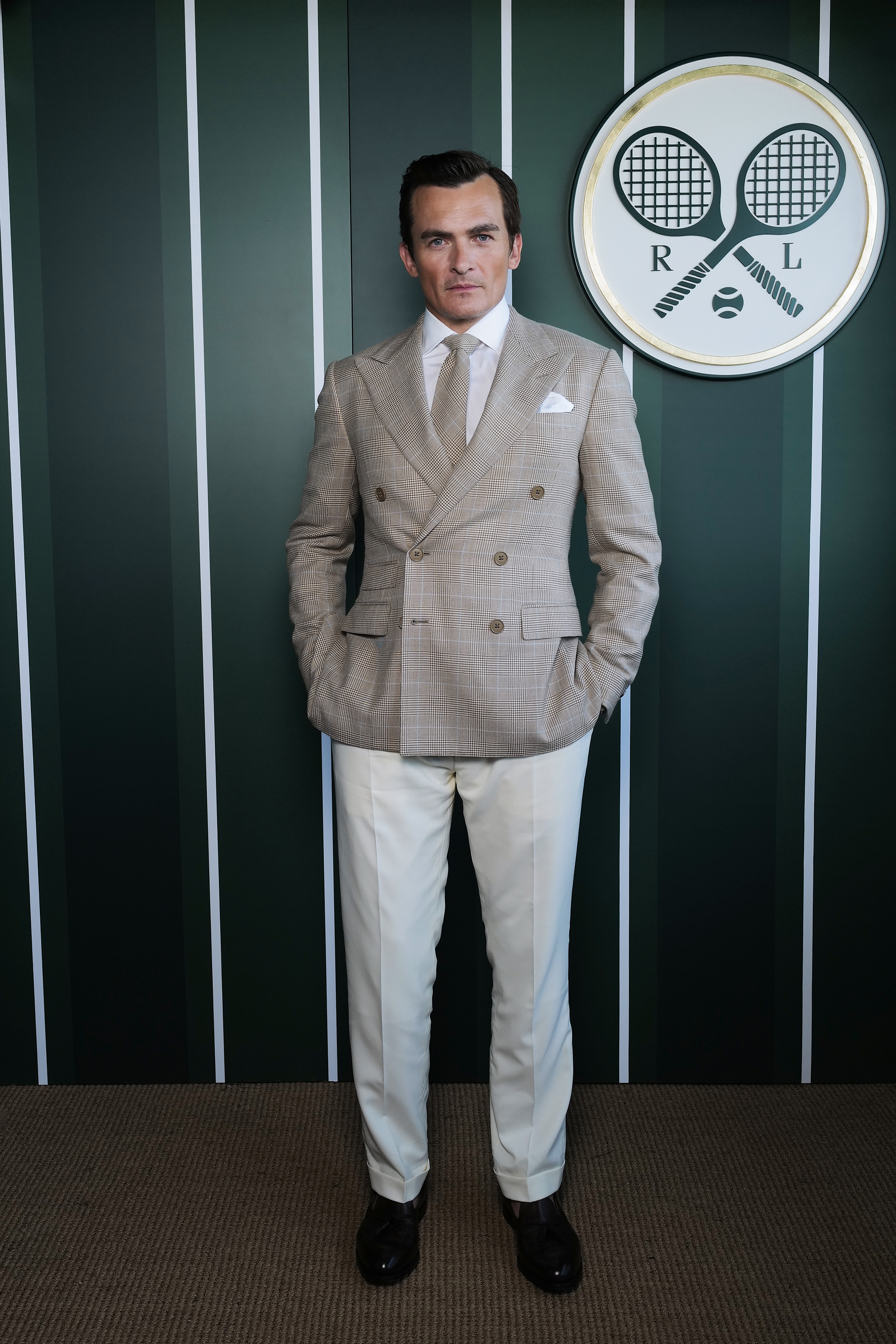 LONDON, ENGLAND - JULY 12: Rupert Friend, wearing Ralph Lauren, attends the Ralph Lauren Suite during The Championships, Wimbledon at All England Lawn Tennis and Croquet Club on July 12, 2025 in London, England. (Photo by Darren Gerrish/WireImage Getty Images for Ralph Lauren)