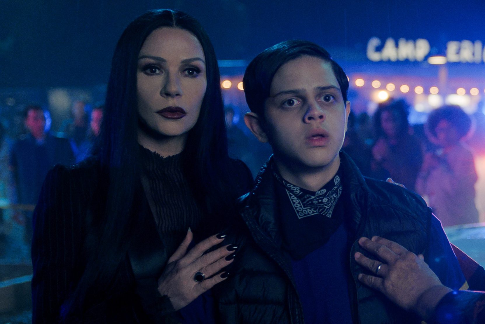 Wednesday. (L to R) Catherine Zeta-Jones as Morticia Addams, Isaac Ordonez as Pugsley Addams, Luis Guzmán as Gomez Addams in episode 203 of Wednesday. Cr. Courtesy of Netflix © 2025
