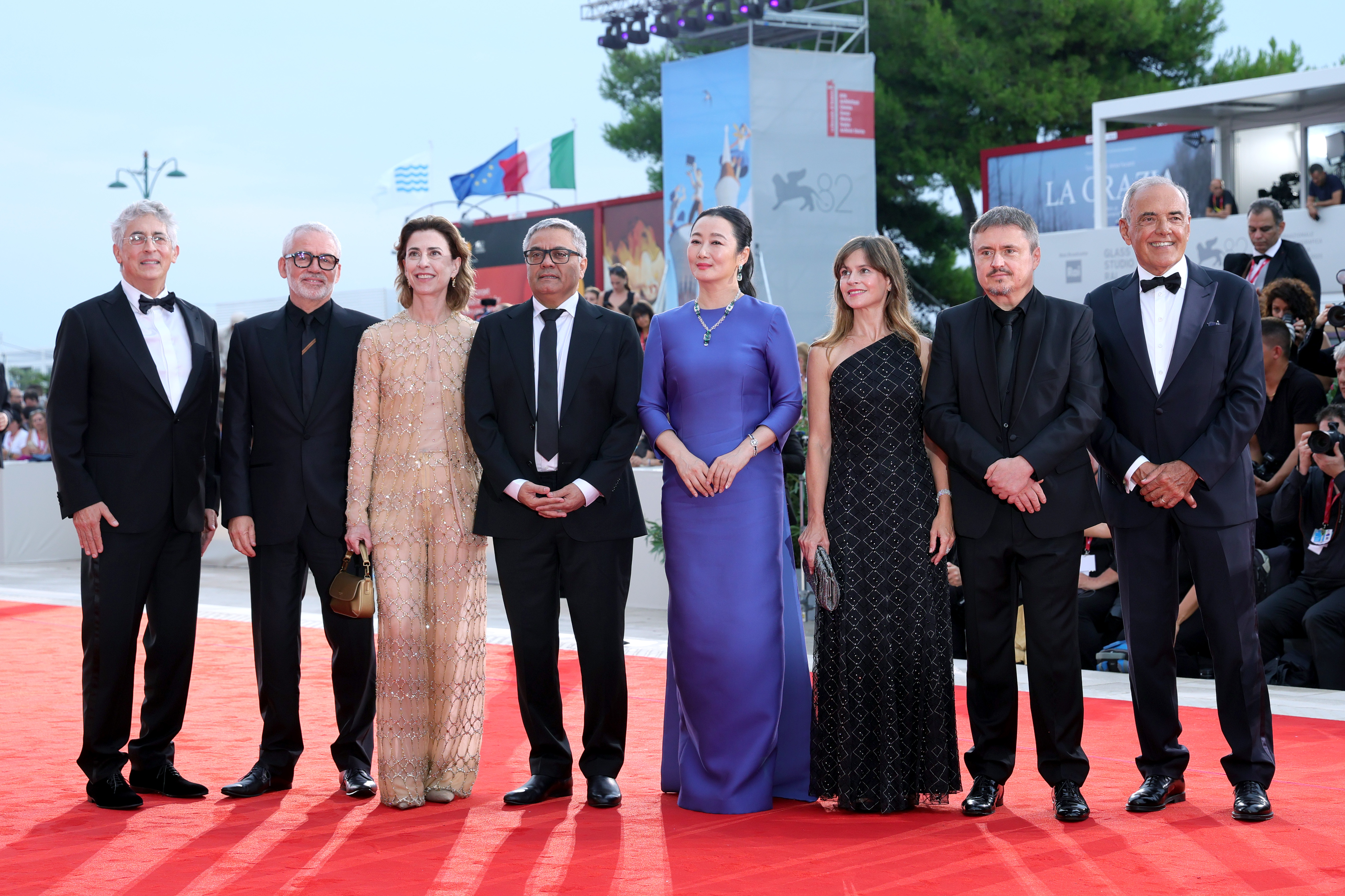 VENICE, ITALY - AUGUST 27: President of the 82nd Venice International Film Festival Alexander Payne, jury members Stéphane Brizé, Fernanda Torres, Mohammad Rasoulof, Zhao Tao, Maura Delpero, Cristian Mungiu and Director of the 82nd Venice Film Festival Alberto Barbera attend the "La Grazia" red carpet during the 82nd Venice International Film Festival on August 27, 2025 in Venice, Italy. (Photo by Vittorio Zunino Celotto/Getty Images)