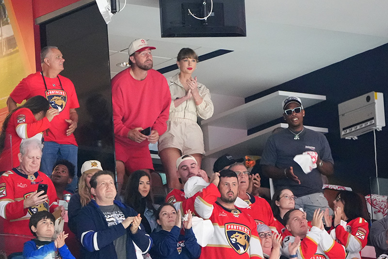 SUNRISE, FLORIDA - JUNE 12: NFL player Travis Kelce and singer Taylor Swift are seen during the first period of Game Four of the 2025 Stanley Cup Final between the Edmonton Oilers and the Florida Panthers at Amerant Bank Arena on June 12, 2025 in Sunrise, Florida. (Photo by Brian Babineau/NHLI via Getty Images)