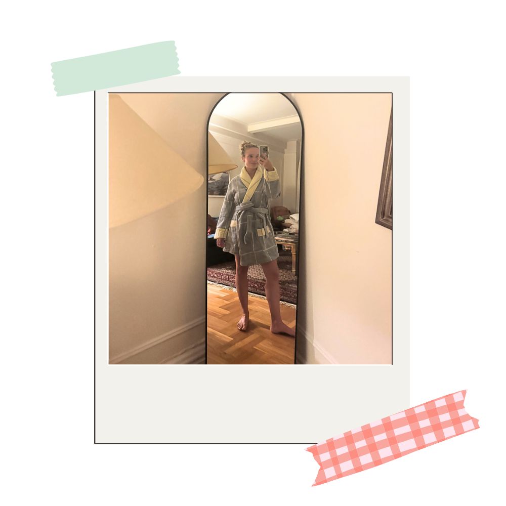 writer testing out cozy earth's windowpane resort robe