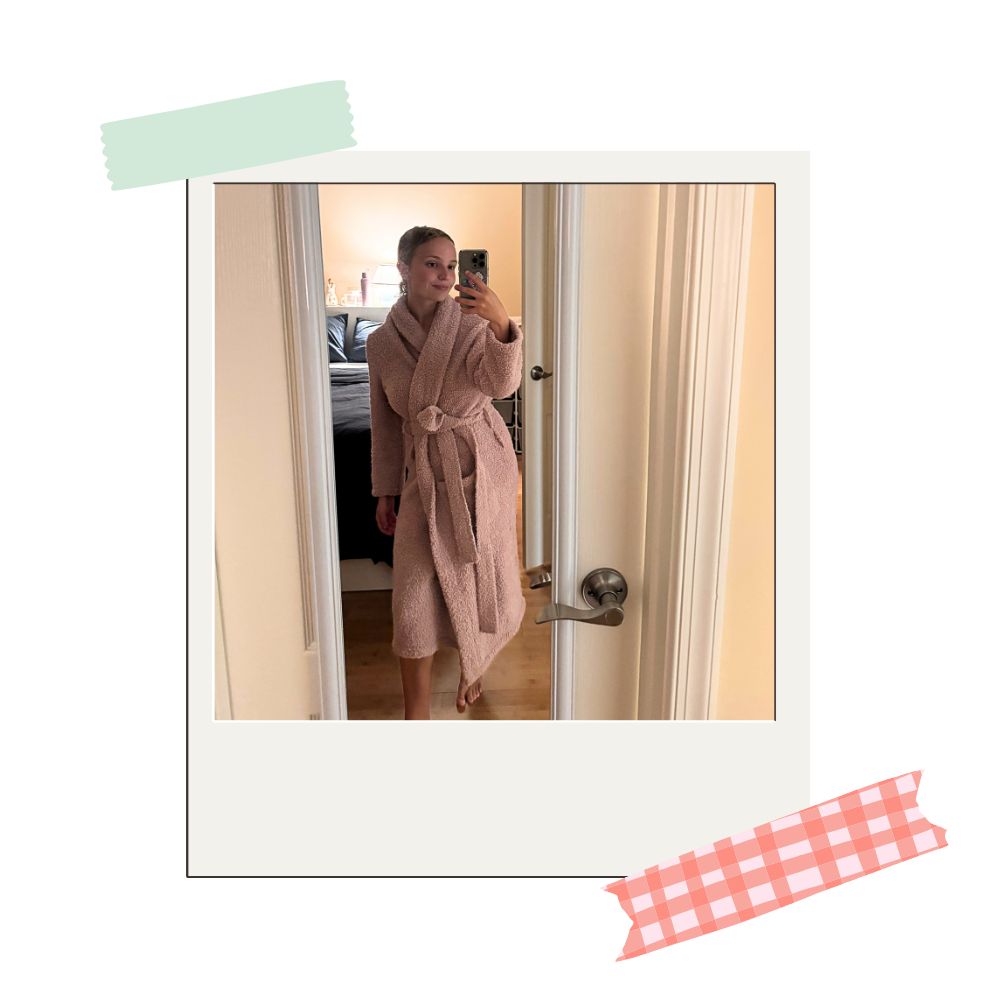 writer testing out barefoot dream's cozychic robe in a pink shade
