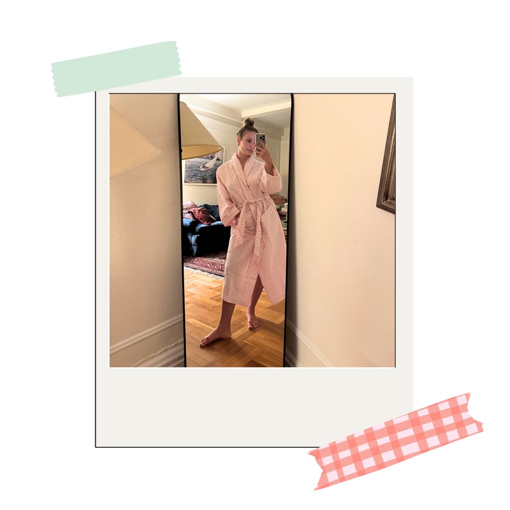 writer testing out matouk's matteo robe in the pink peony hue
