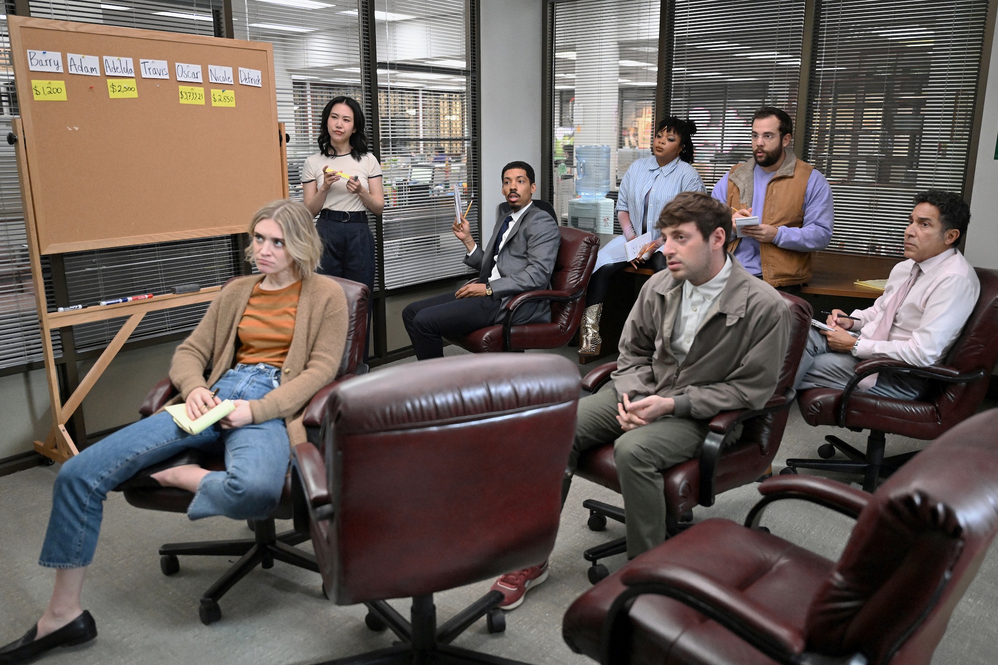 The Paper -- Episode 105 -- Pictured: (l-r) Chelsea Frei as Mare, Ramona Young as Nicole, Melvin Gregg as Detrick, Gbemisola Ikumelo as Adelola, Alex Edelman as Adam, Eric Rahill as Travis, Oscar Nunez as Oscar -- (Photo by: John P. Fleenor/PEACOCK)