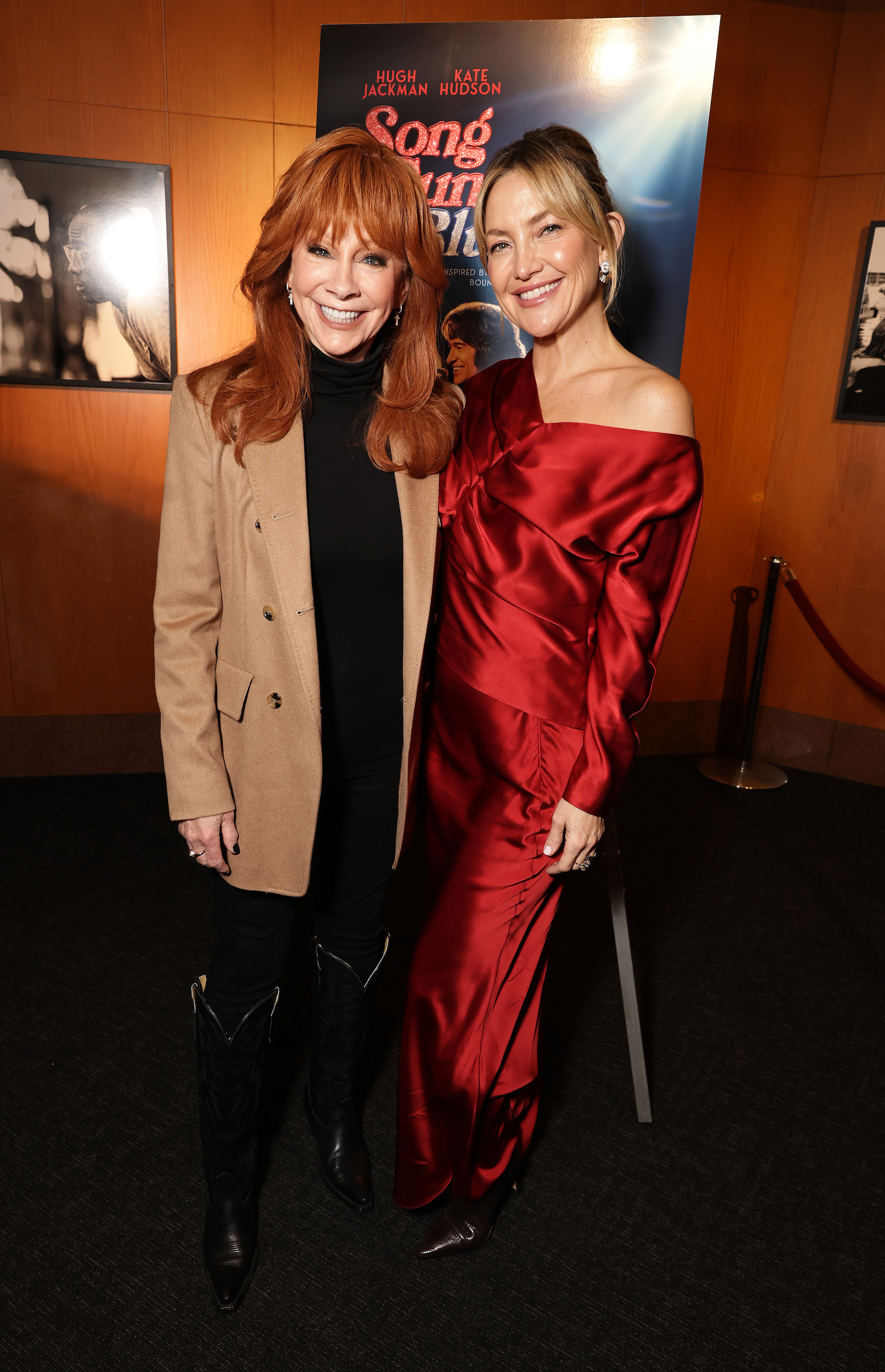 Reba McEntire and Kate Hudson, who opted for a red silky dress with draped details, at a special screening of 'Song Sung Blue' on Saturday in Los Angeles. Kate Hudson style, satin dress, silk dress, red gown