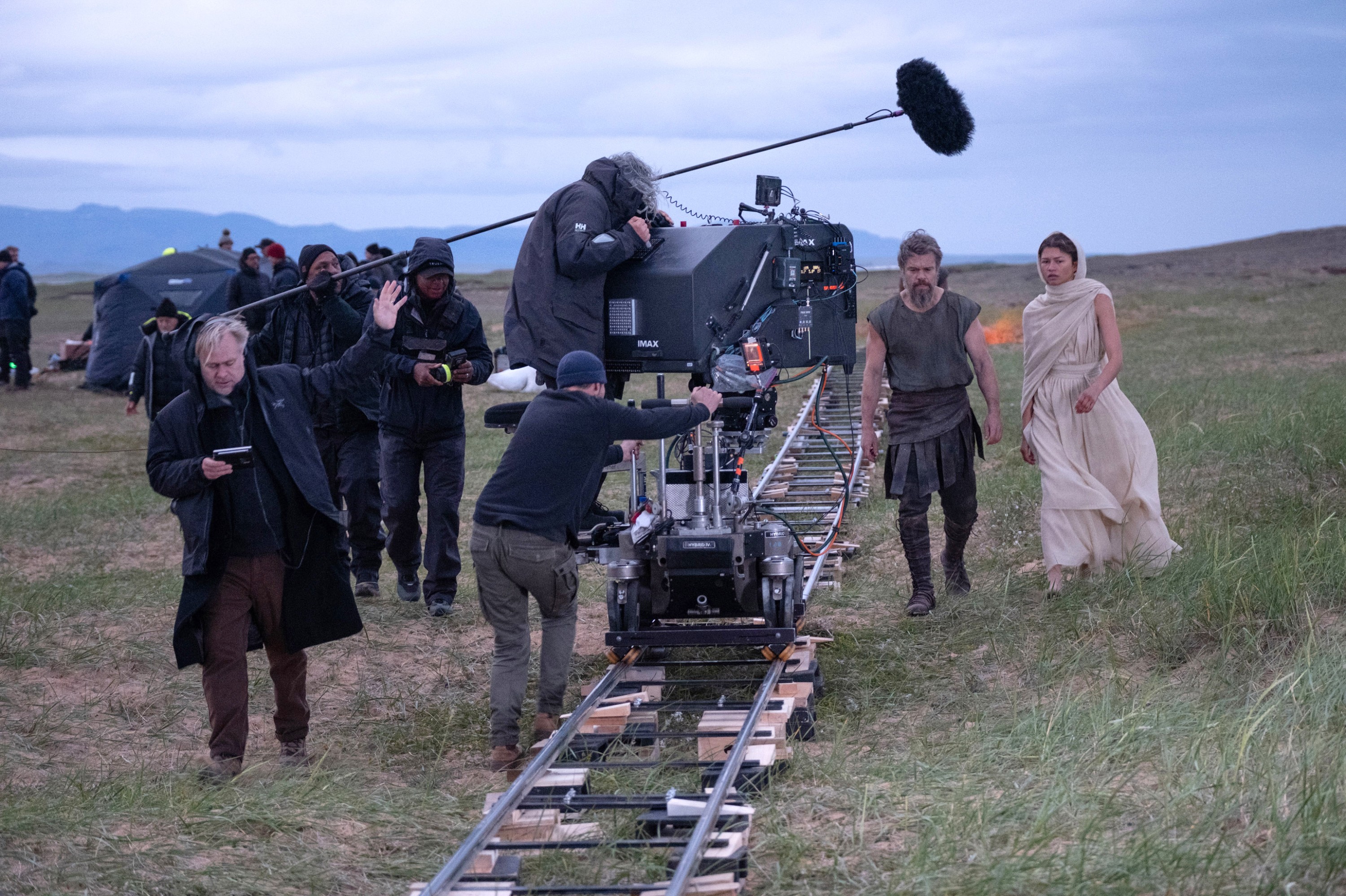 'THE ODYSSEY', director Christopher Nolan (left), Matt Damon, Zendaya (right), on set.